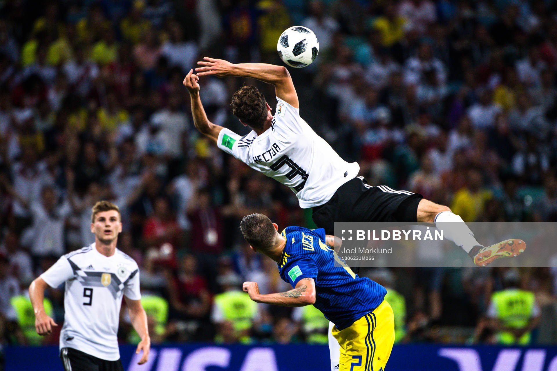 Mikael Lustig of Sweden and Jonas Hector of Germany