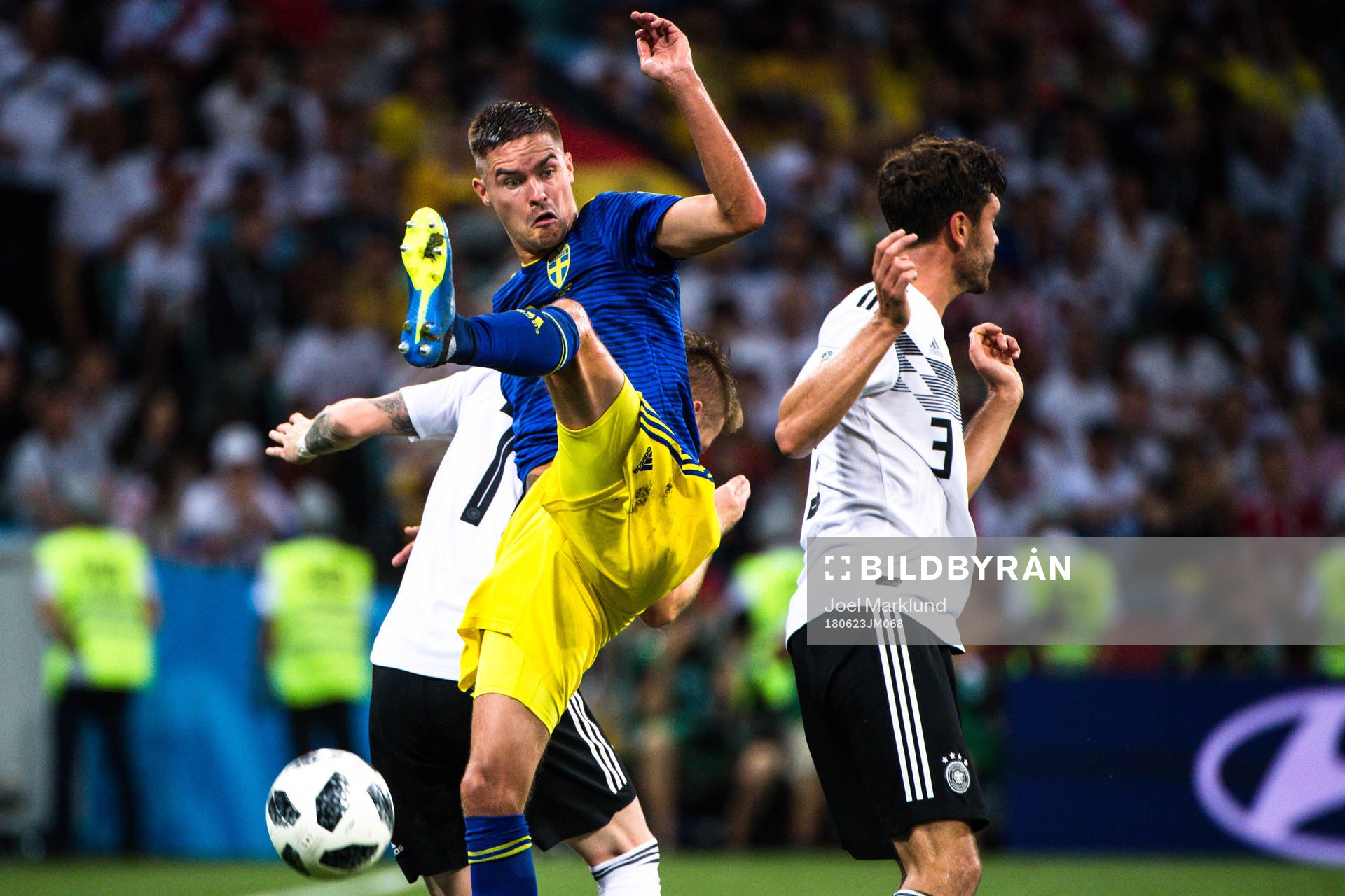 Mikael Lustig of Sweden and Jonas Hector of Germany