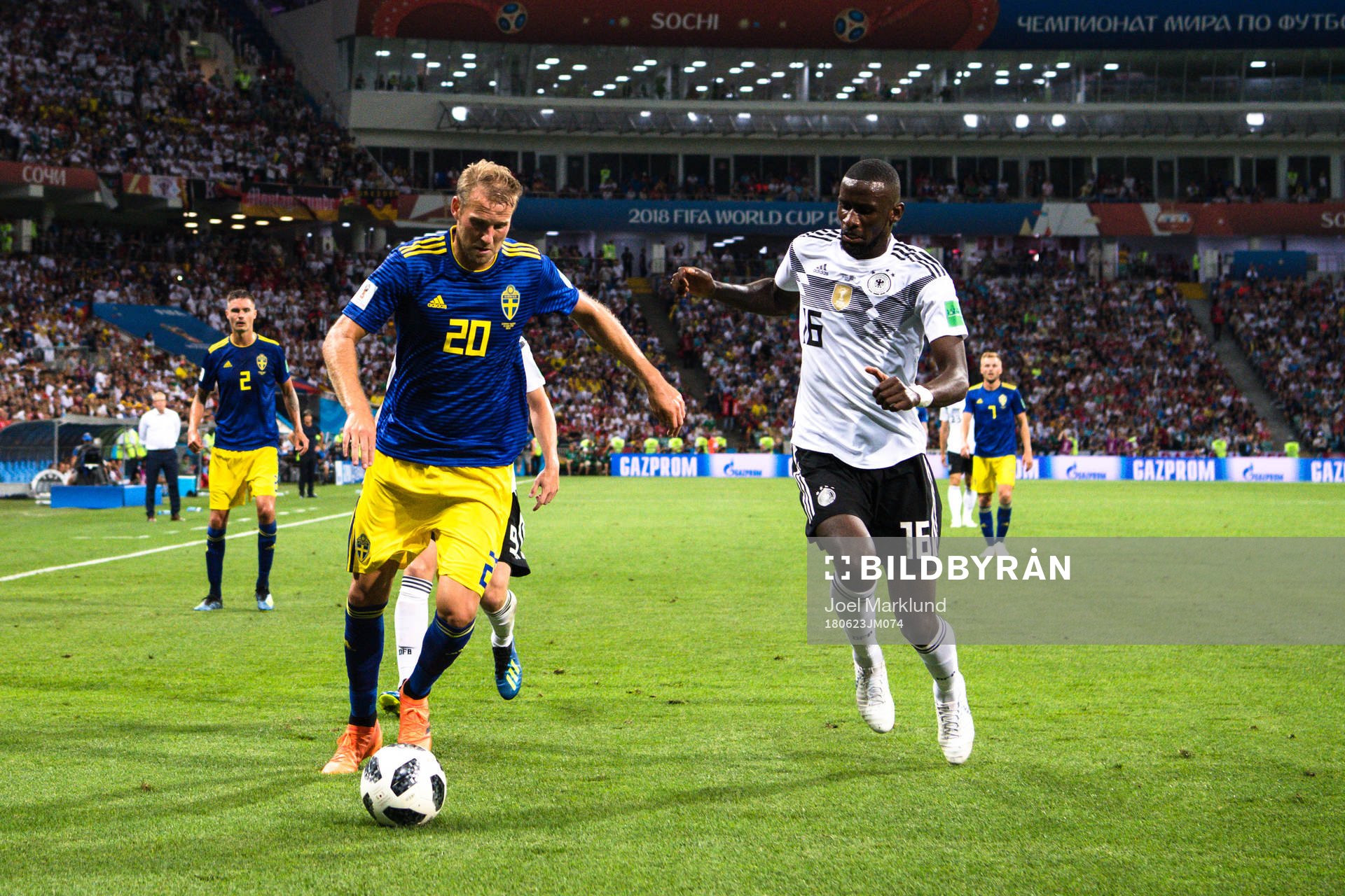 Ola Toivonen of Sweden and Sami Khedira  of Germany