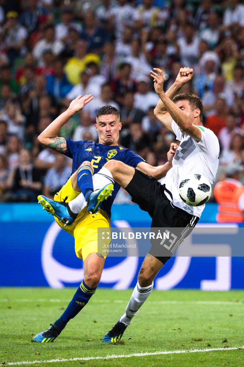Mikael Lustig of Sweden and Thomas Müller of Germany