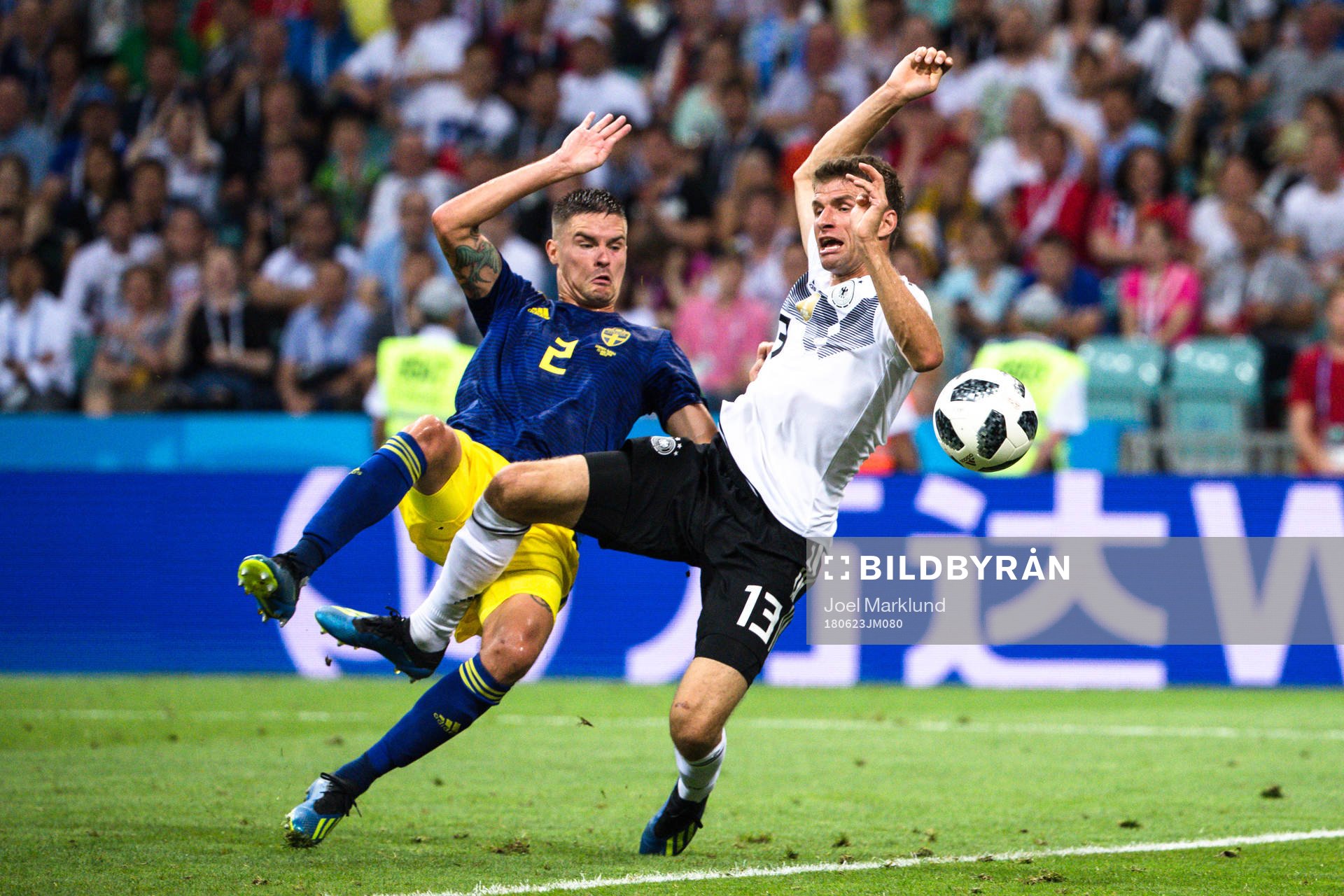Mikael Lustig of Sweden and Thomas Müller of Germany