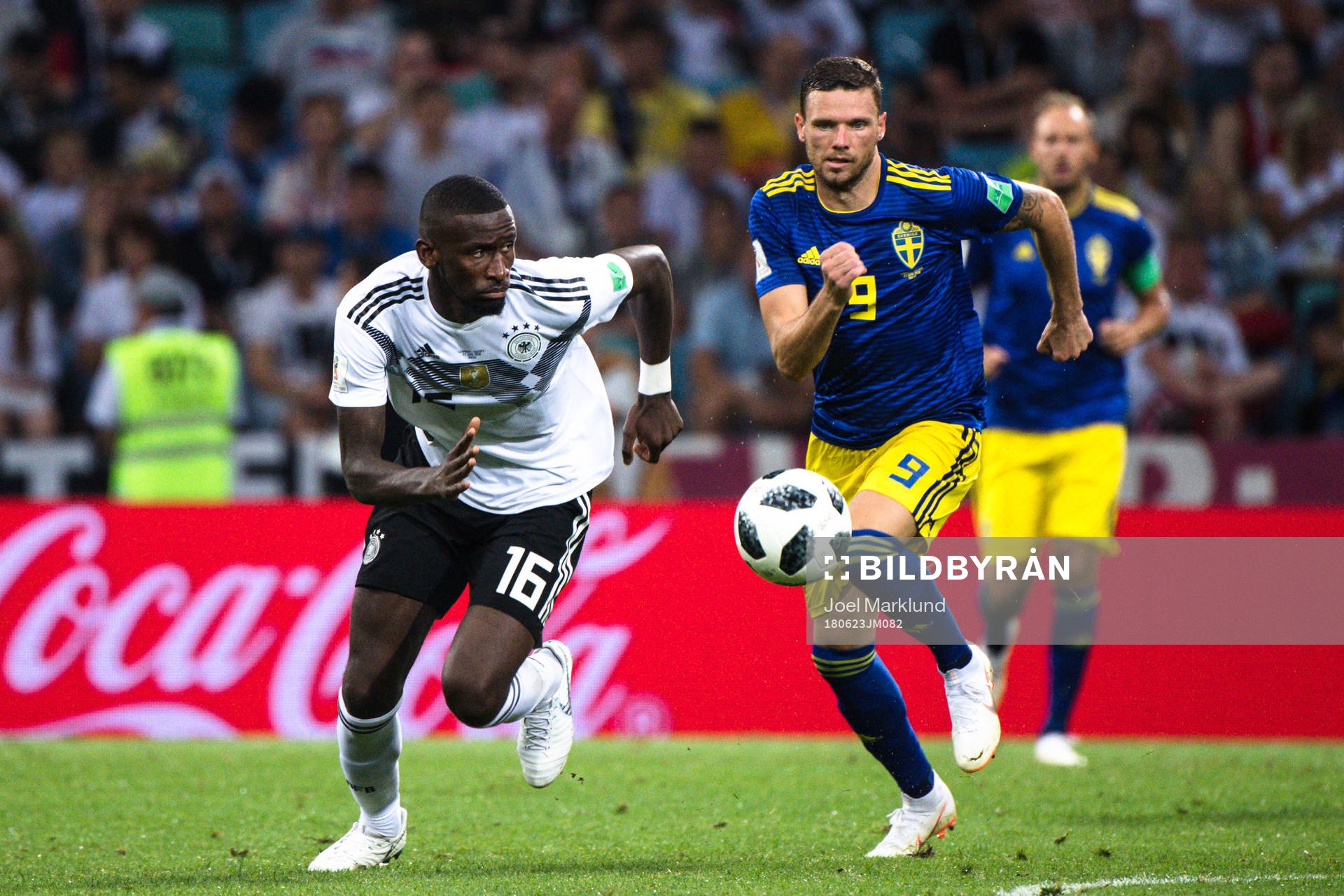Antonio Rüdiger of Germany and Marcus Berg of Sweden