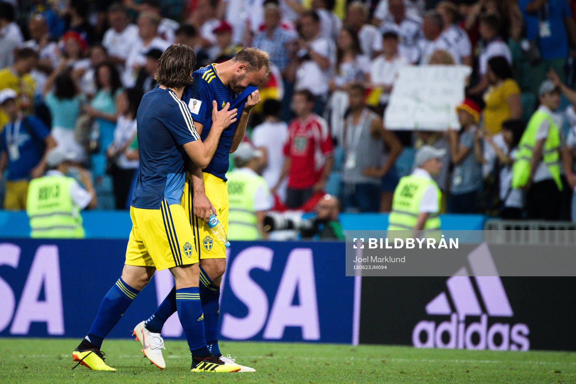 Gustav Svensson and Andreas Granqvist of Sweden looks