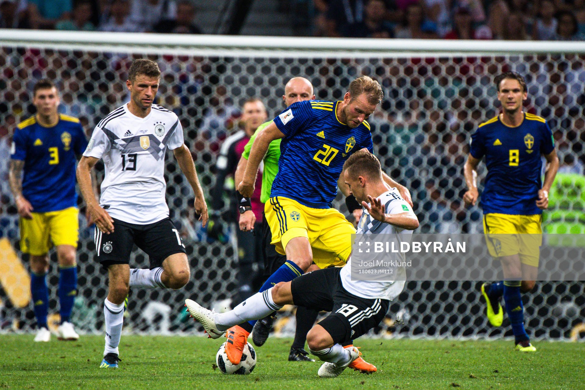 Ola Toivonen of Sweden and Joshua Kimmich of Germany
