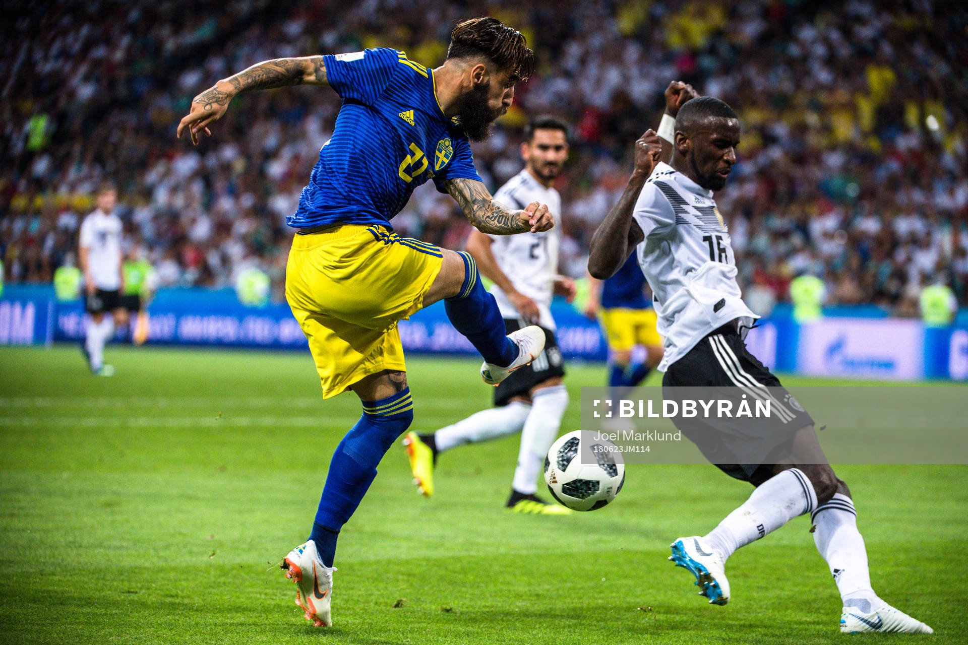 Jimmy Durmaz of Sweden and Antonio Rüdiger of Germany