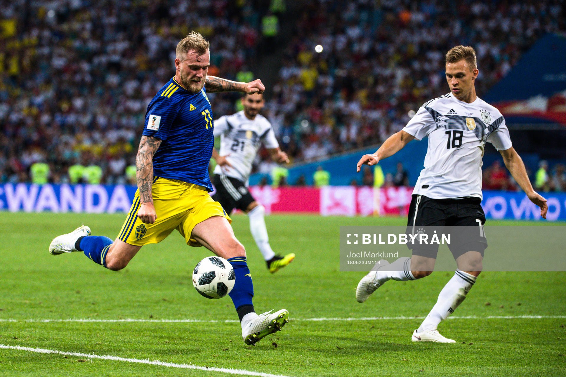 John Guidetti of Sweden and Joshua Kimmich of Germany