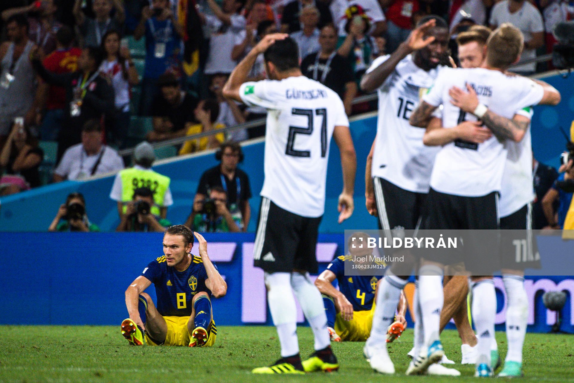 Albin Ekdal and Andreas Granqvist of Sweden looks dejected