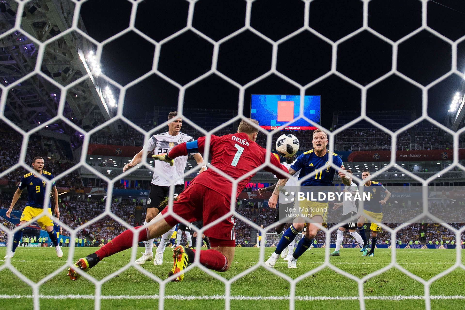 Goalkeeper Manuel Neuer of Germany stops a chance from John
