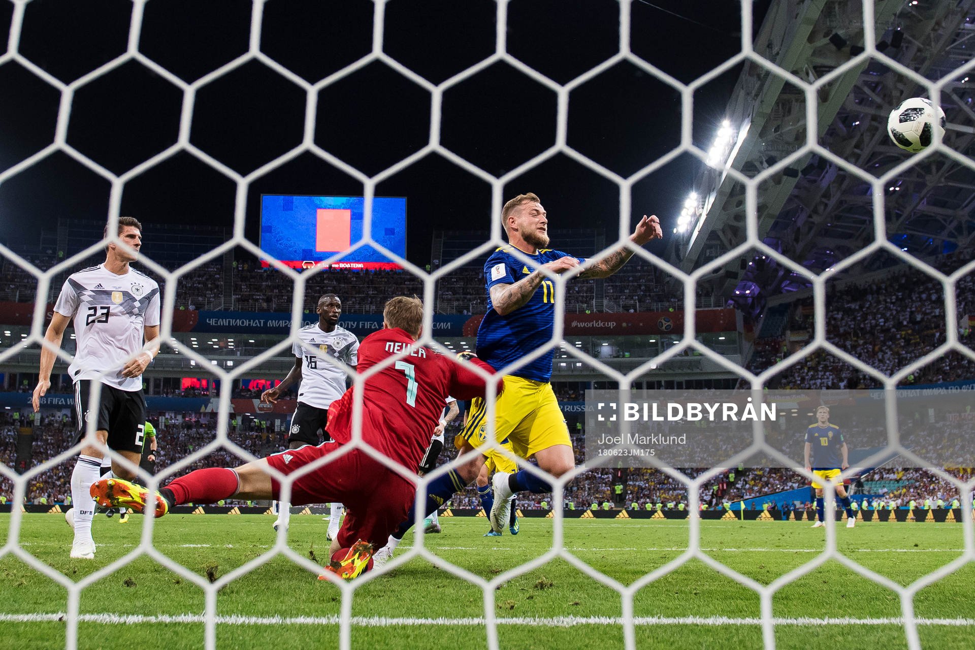 Goalkeeper Manuel Neuer of Germany stops a chance from John