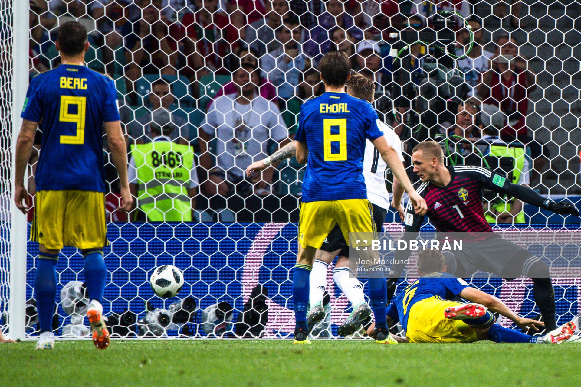 Marco Reus of Germany scores the 1-1 goal behind goalkeeper