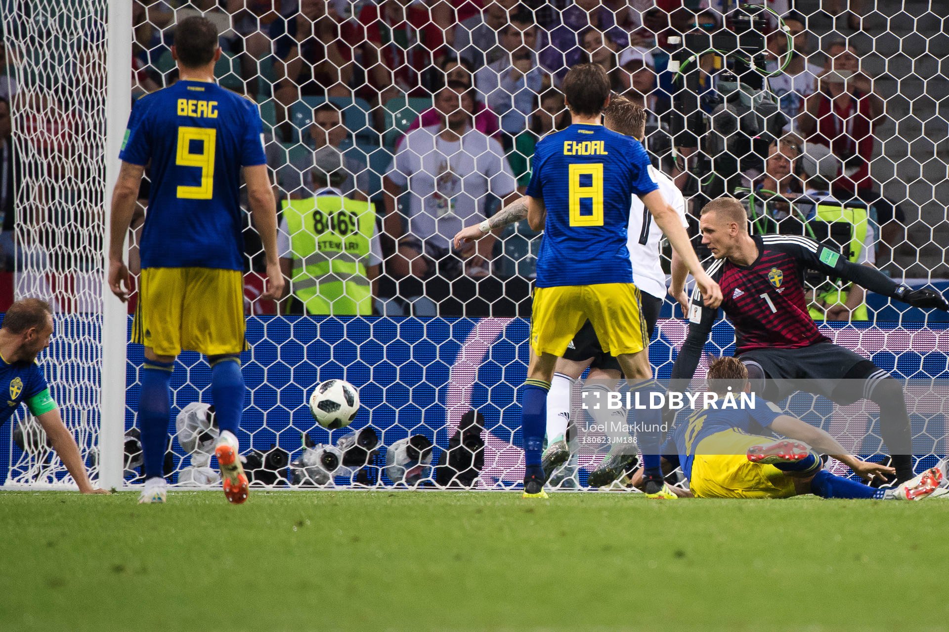 Marco Reus of Germany scores 1-1 behind goalkeeper Robin
