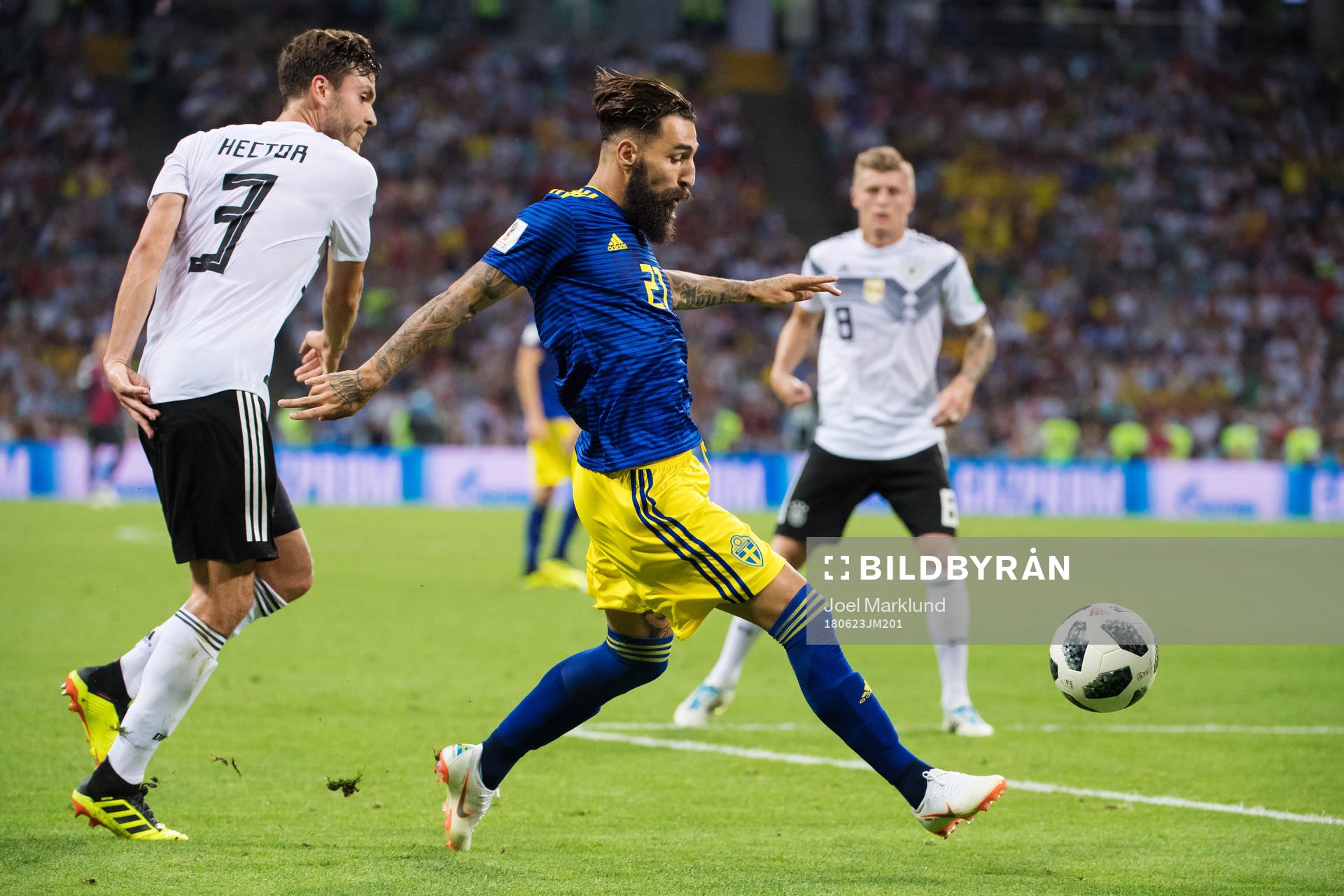 Jonas Hector of Germany and Jimmy Durmaz of Sweden