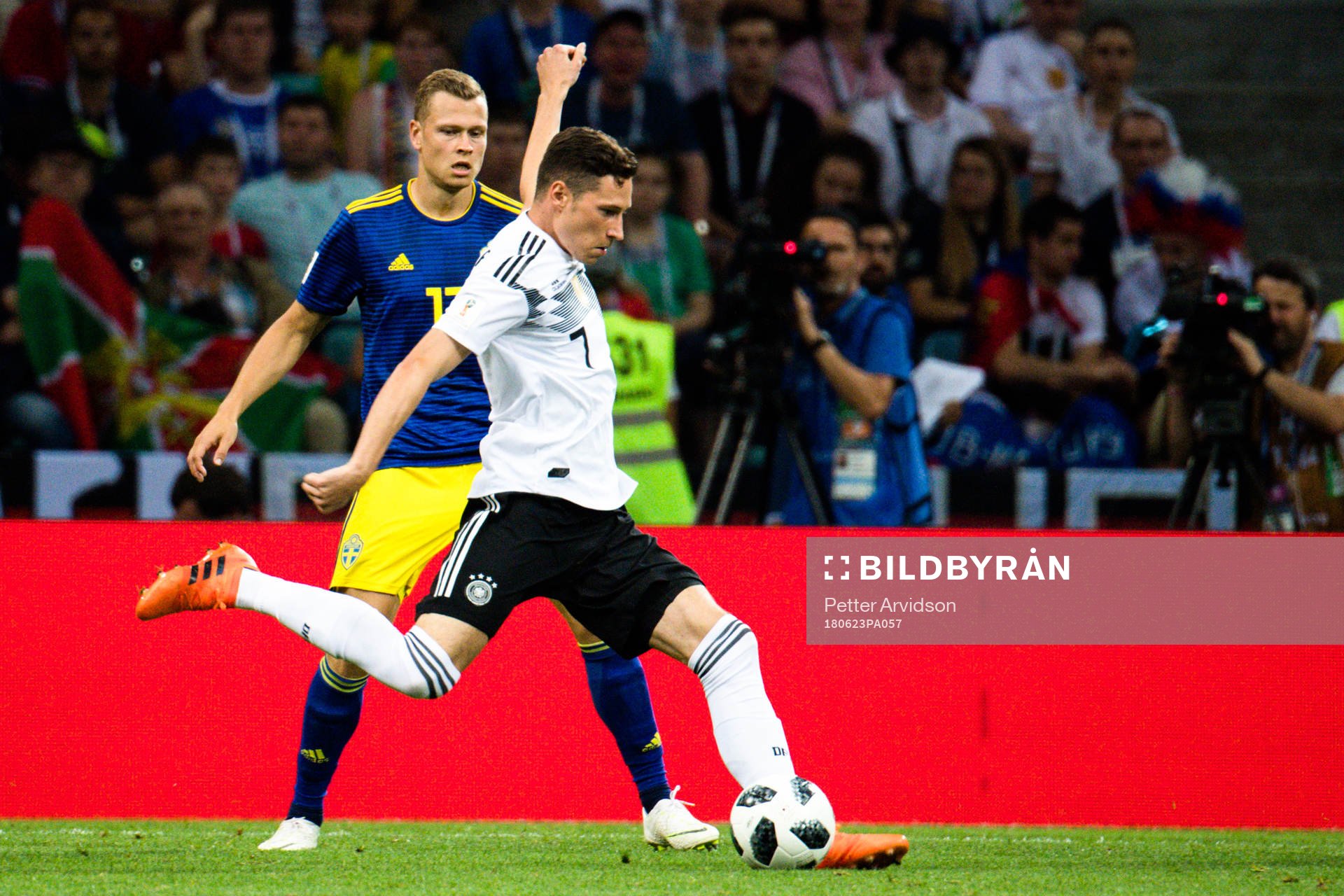 Viktor Claesson of Sweden and Julian Draxler of Germany