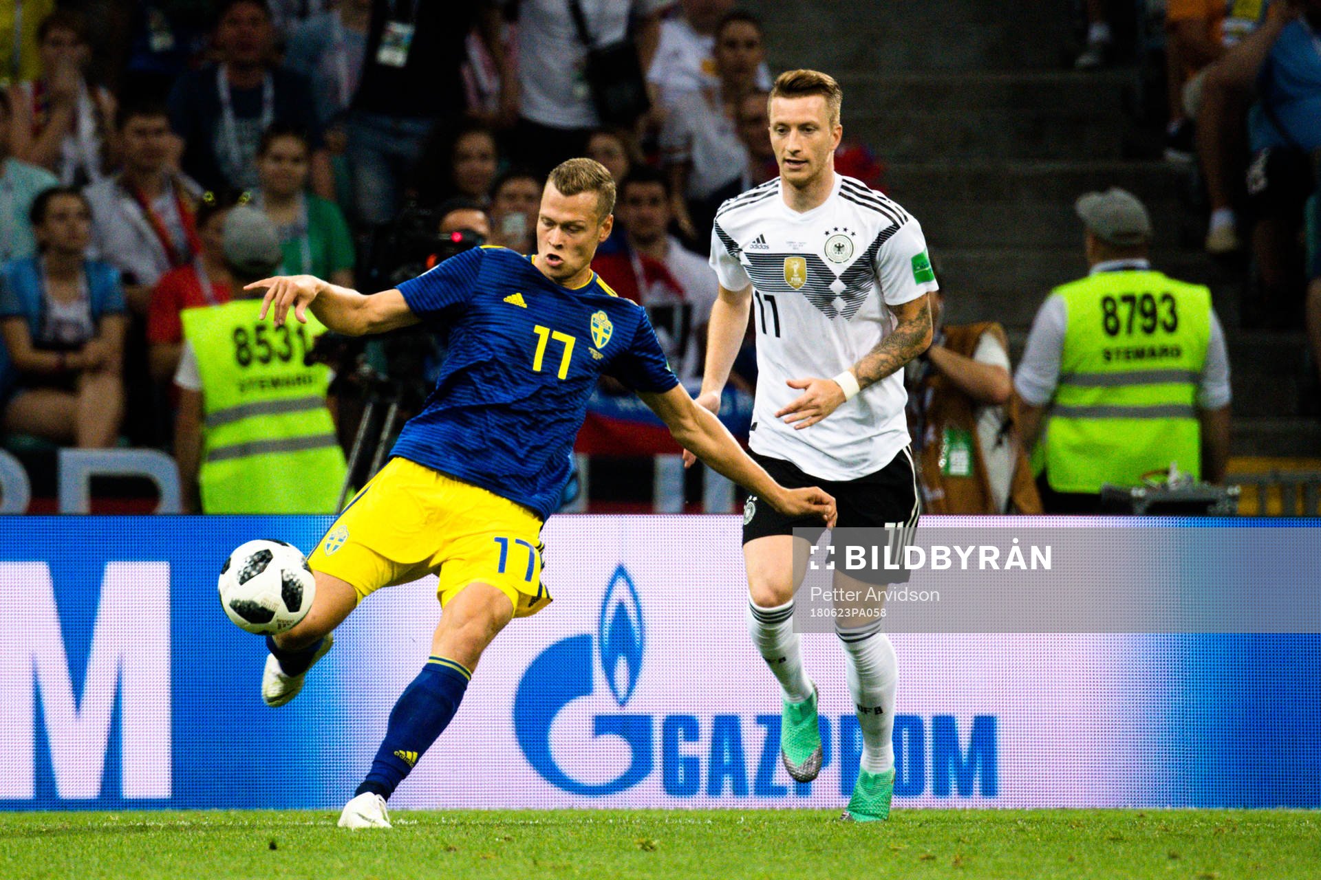 Viktor Claesson of Sweden and Marco Reus of Germany