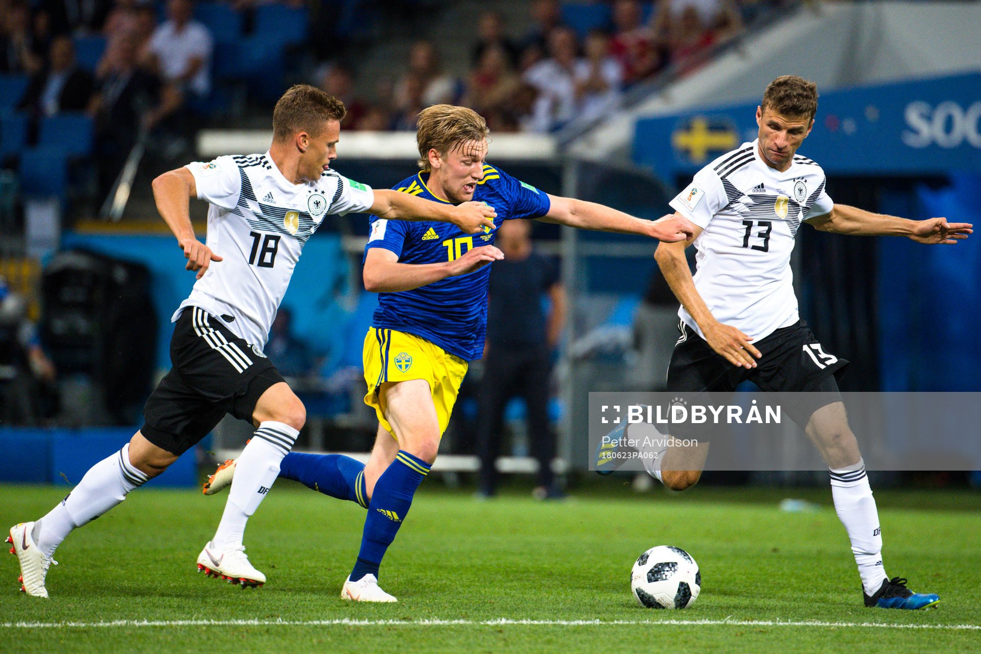 Emil Forsberg of Sweden against Joshua Kimmich and Thomas
