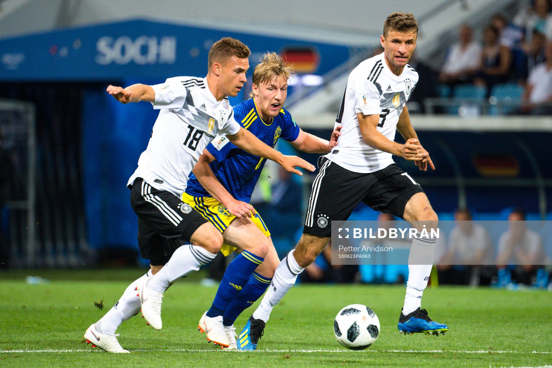 Emil Forsberg of Sweden against Joshua Kimmich and Thomas