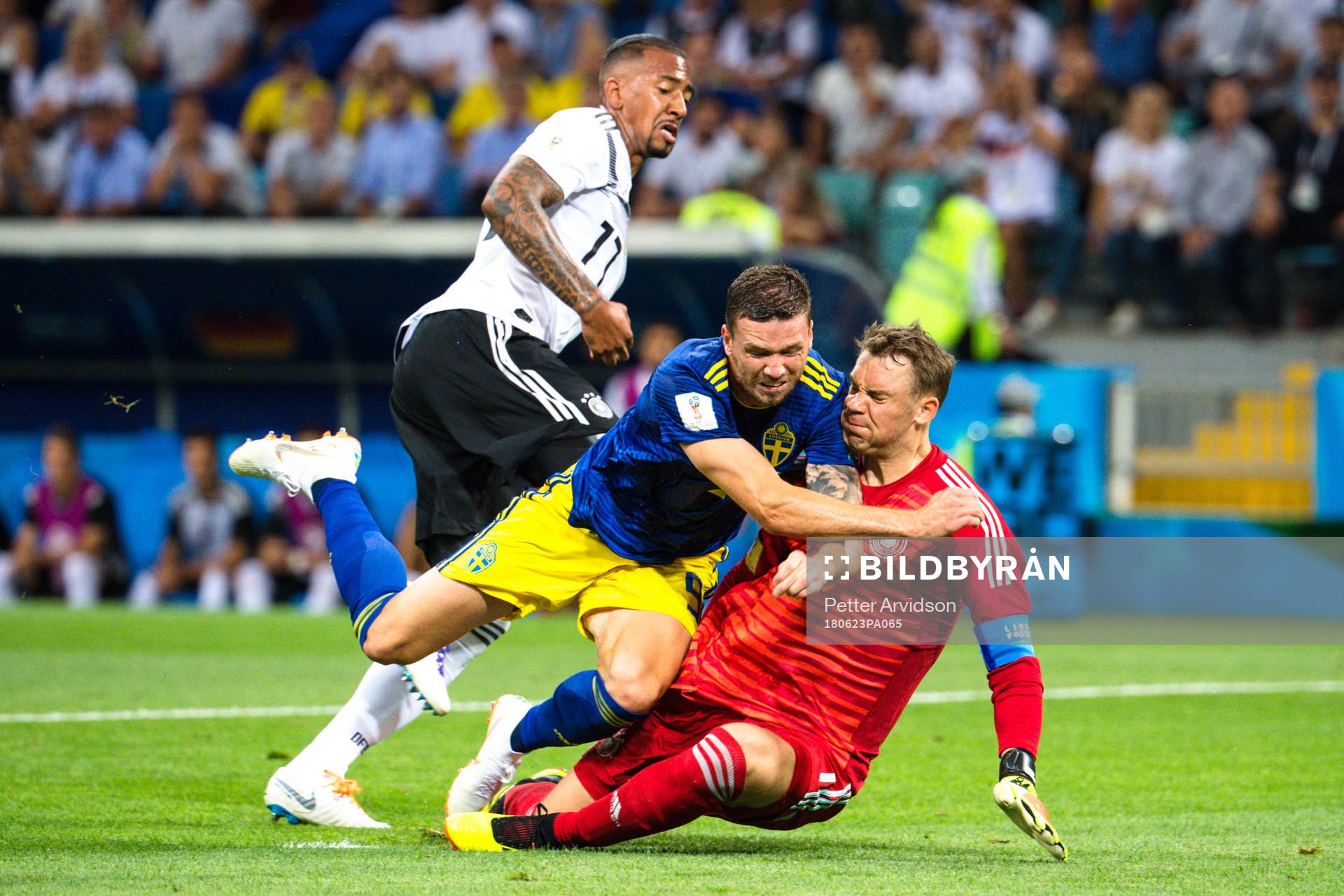 Marcus Berg of Sweden against goalkeeper Manuel Neuer of