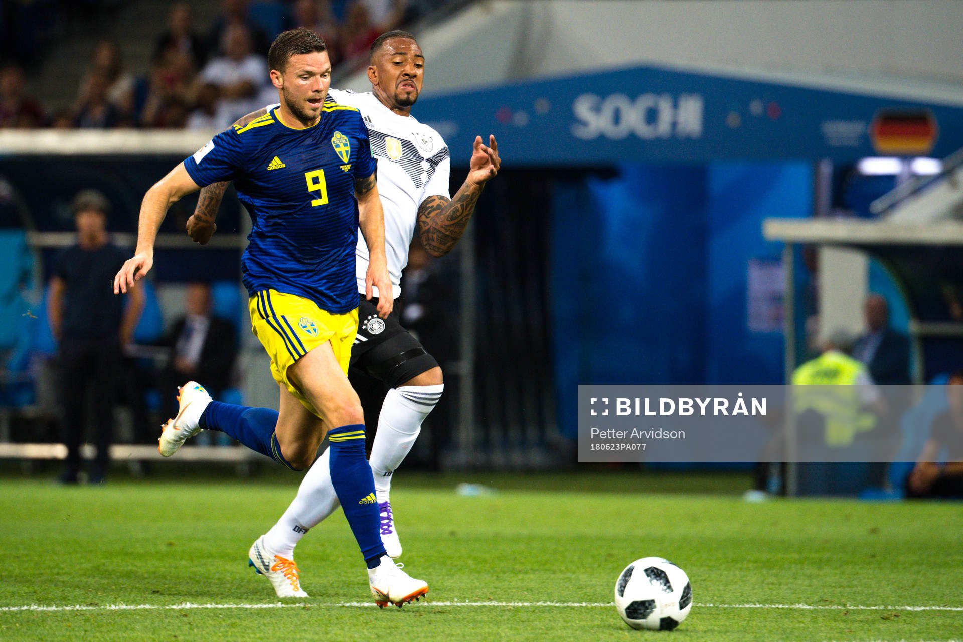 Marcus Berg of Sweden and Jerome Boateng of Germany