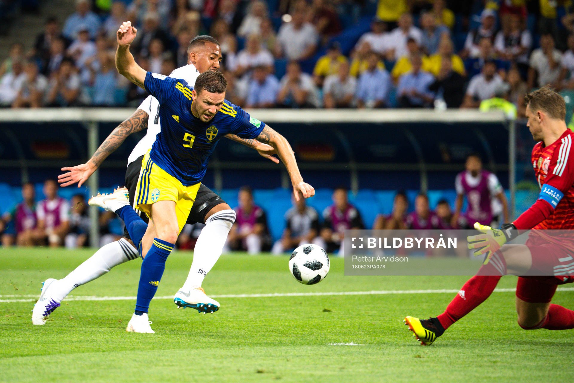 Marcus Berg of Sweden and Jerome Boateng of Germany