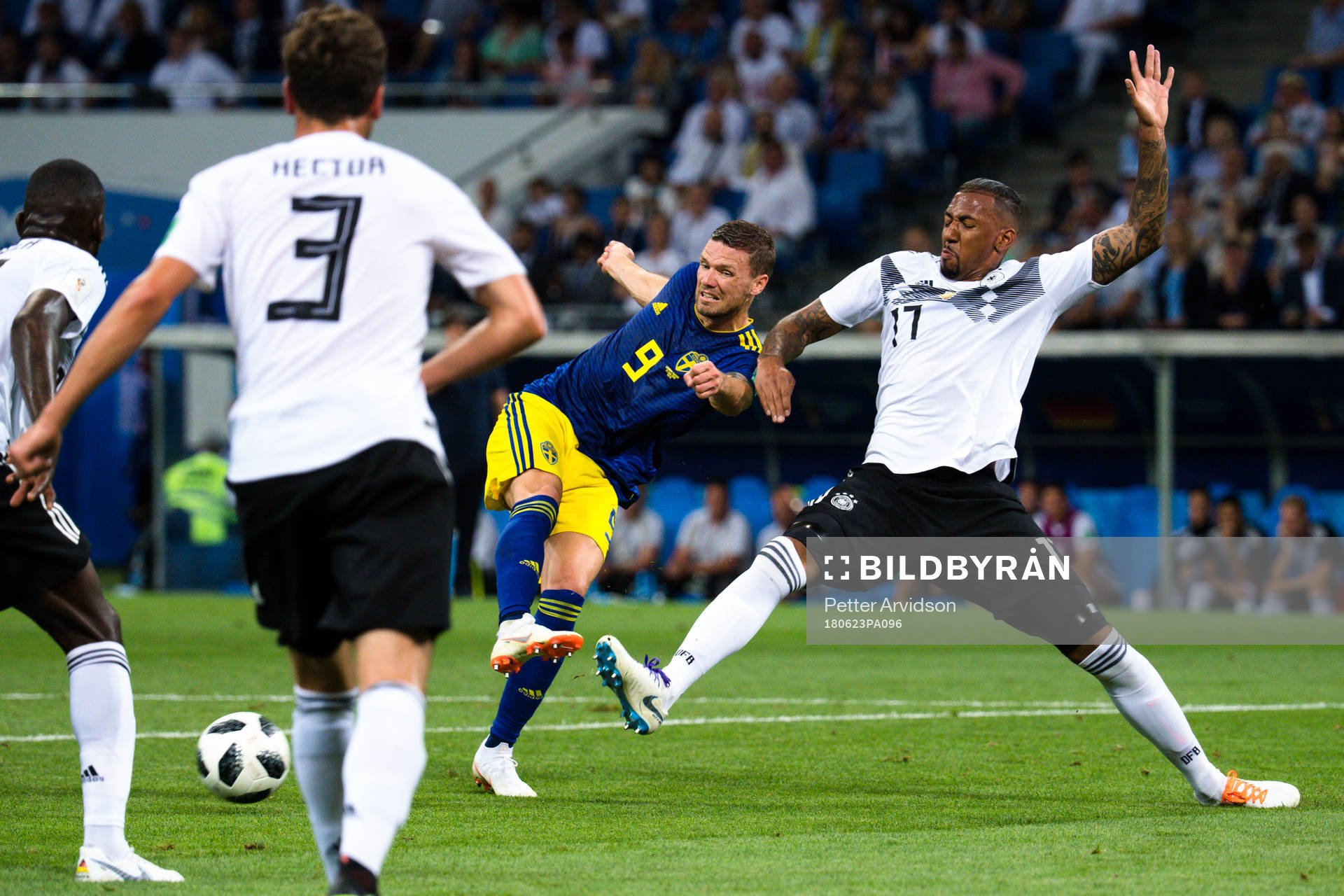 Marcus Berg of Sweden and Jerome Boateng of Germany