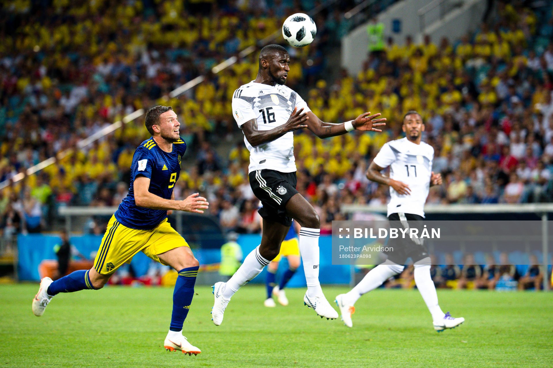 Marcus Berg of Sweden and Antonio Rüdiger of Germany