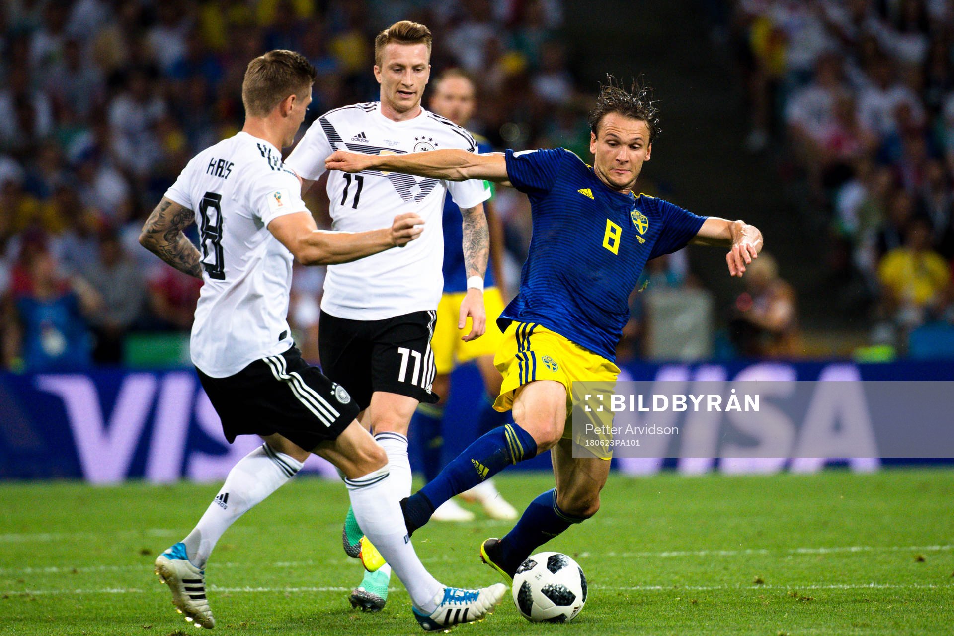 Toni Kroos of Germany and Albin Ekdal of Sweden