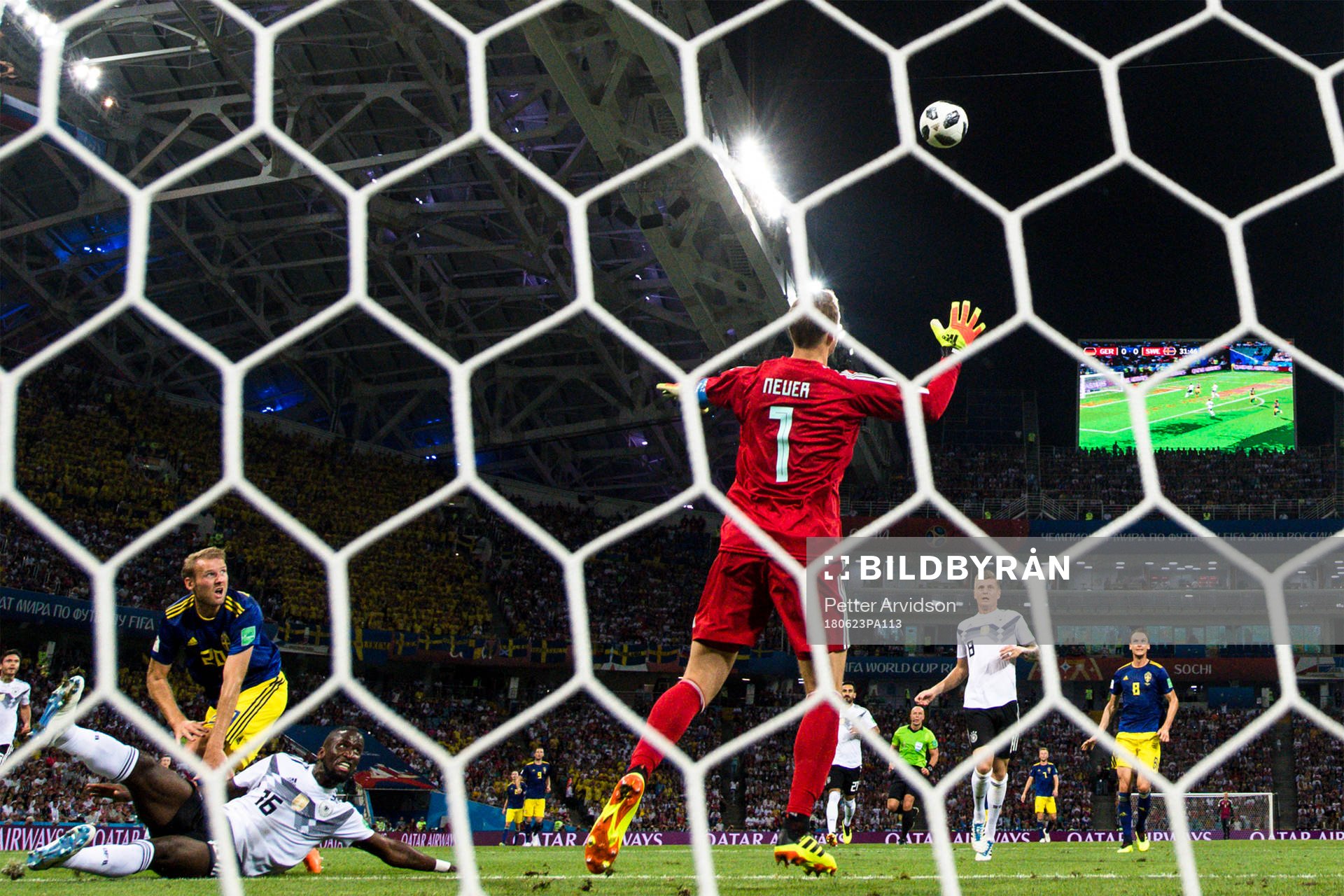 Ola Toivonen of Sweden scores the 1-0 goal behind