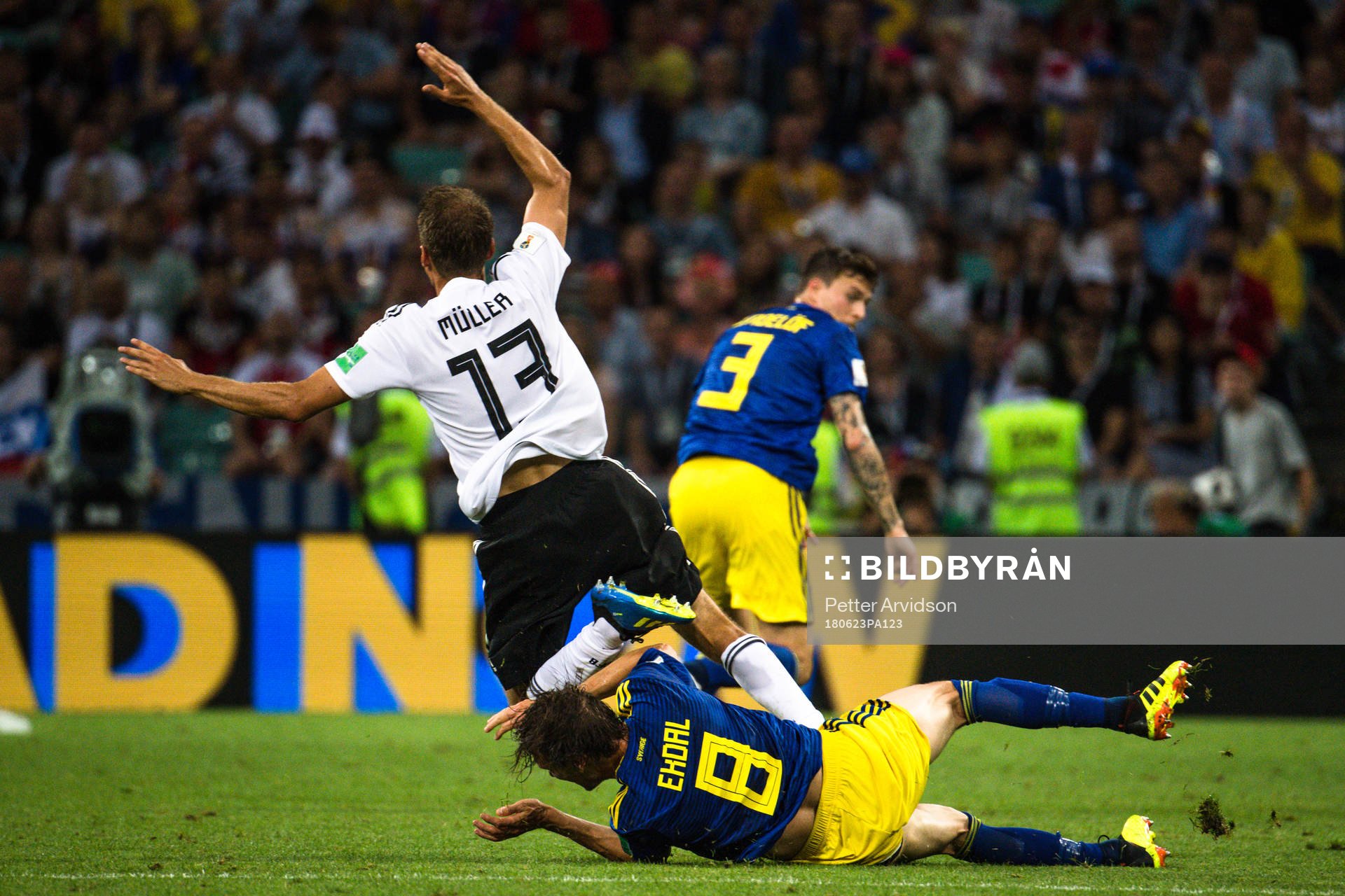 Thomas Müller of Germany and Albin Ekdal of Sweden