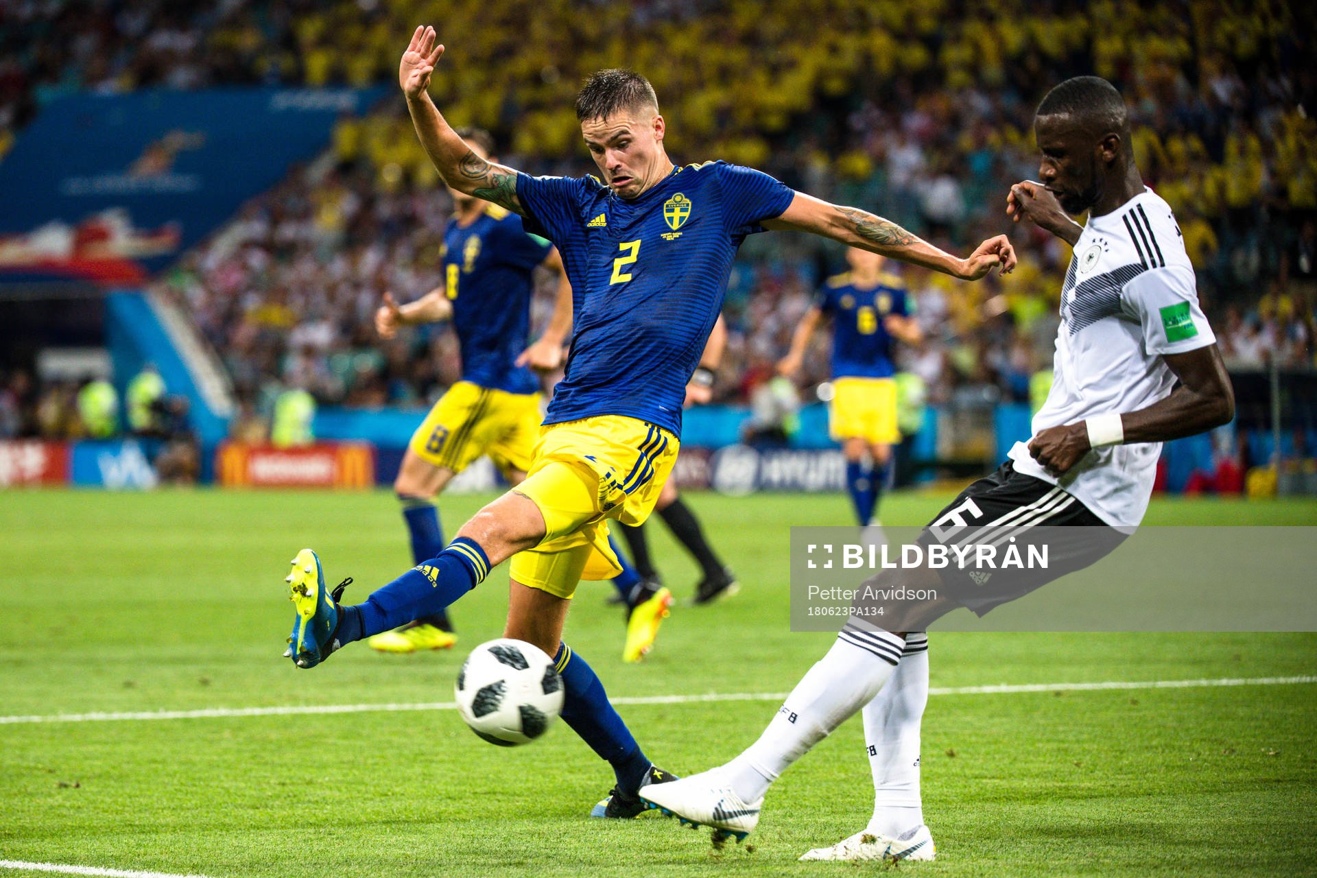 Mikael Lustig of Sweden and Antonio Rüdiger of Germany