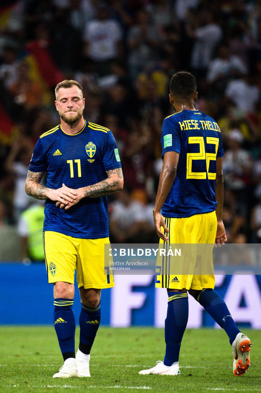 John Guidetti and Isaac Kiese Thelin of Swedenlooks dejected