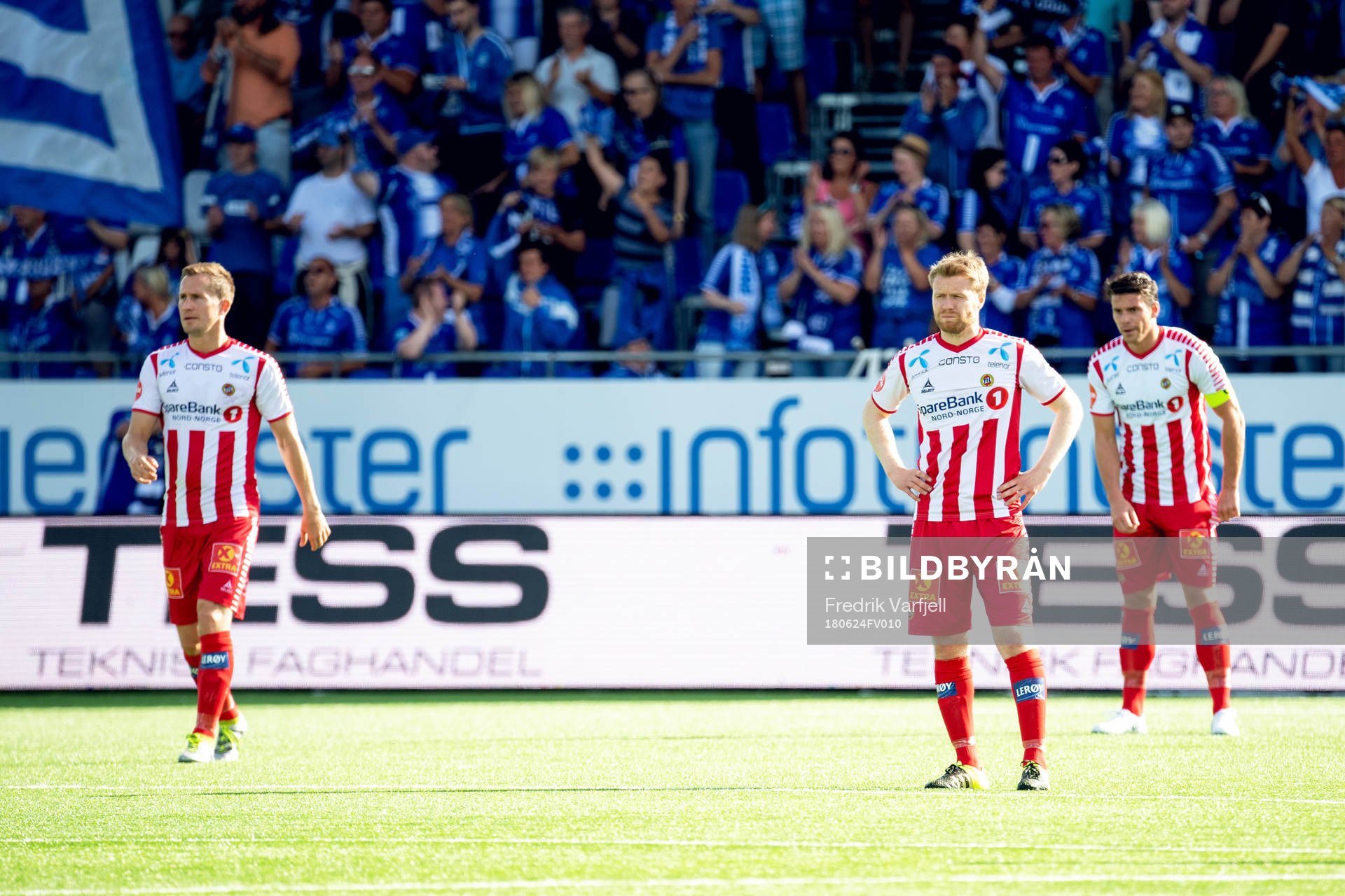 Morten Gamst Pedersen and Tom Høgli of Tromsø looks