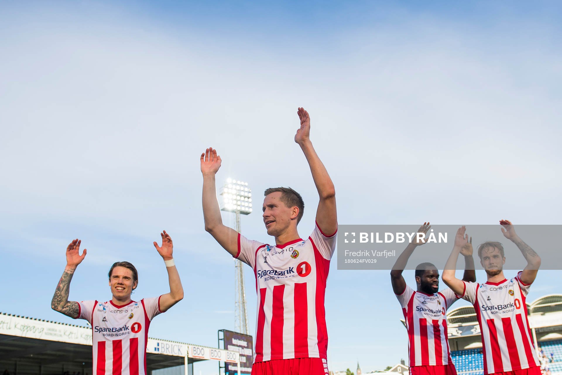 Robert Taylor, Morten Gamst Pedersen, Christian Landu-Landu and Daniel Berntsen of Tromsø celebrate after the Eliteserien match between Sarpsborg 08 and Tromsø on June 24, 2018 in Sarpsborg.