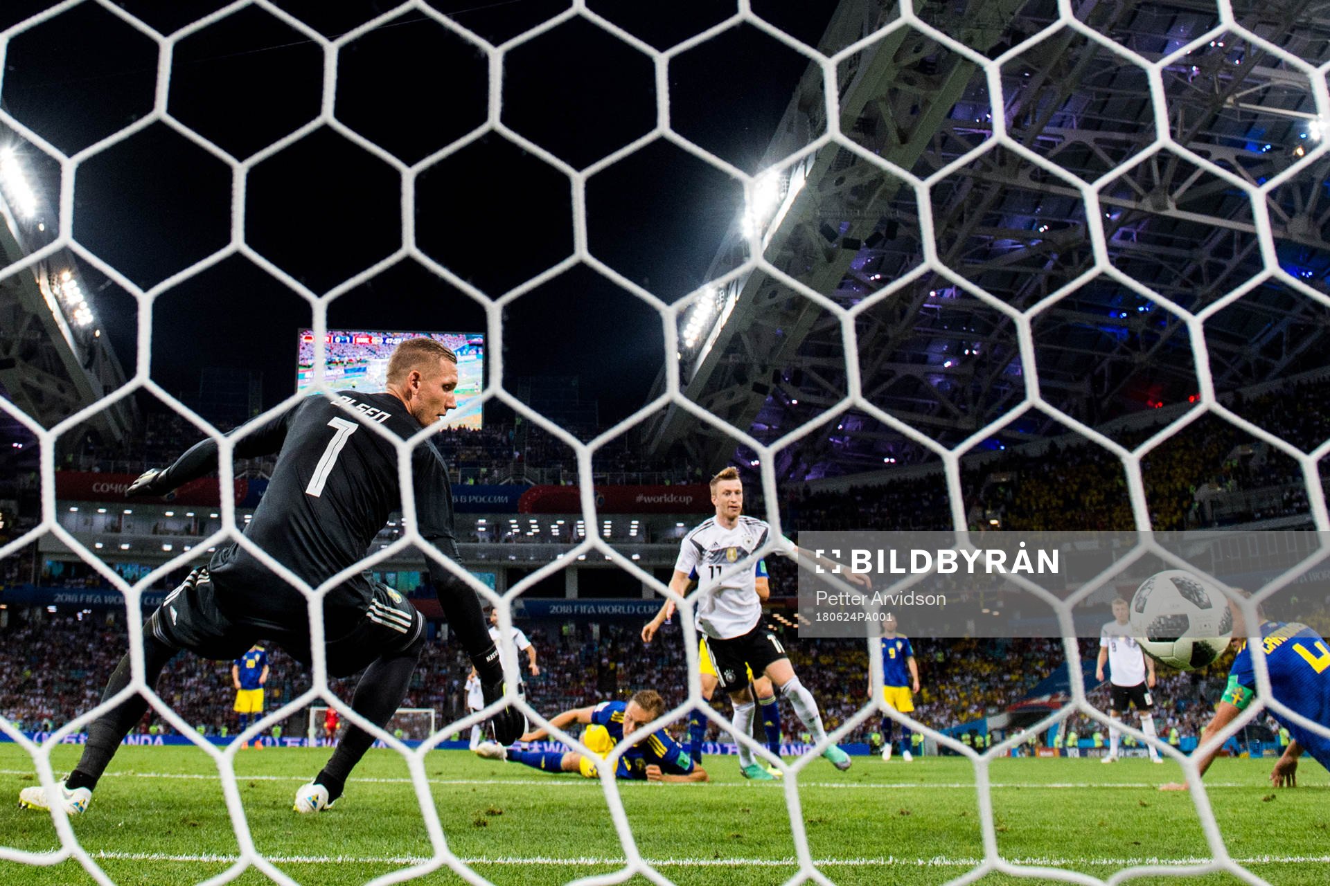Marco Reus of Germany scores 1-1 behind goalkeeper Robin