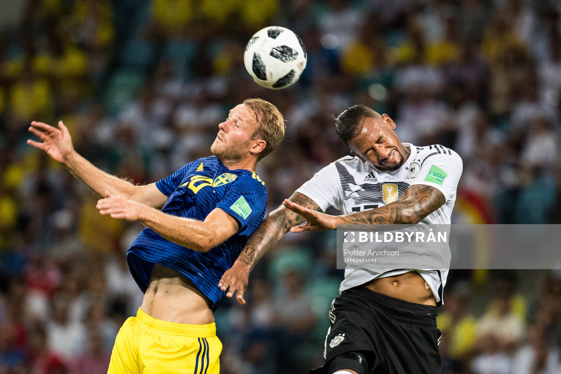 Ola Toivonen of Sweden and Jerome Boateng of Germany