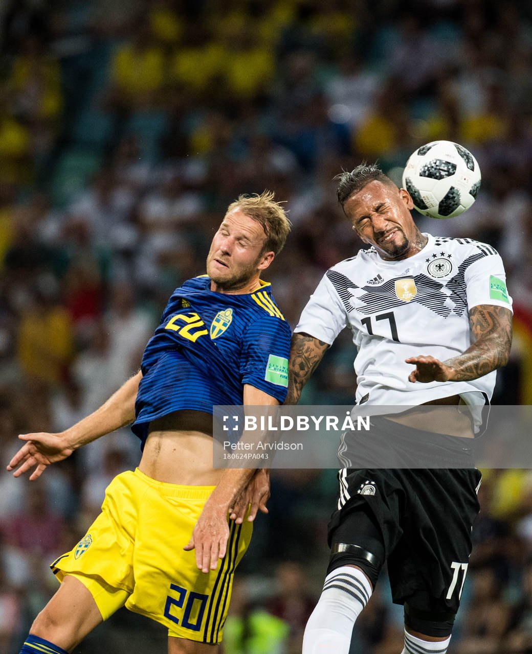 Ola Toivonen of Sweden and Jerome Boateng of Germany