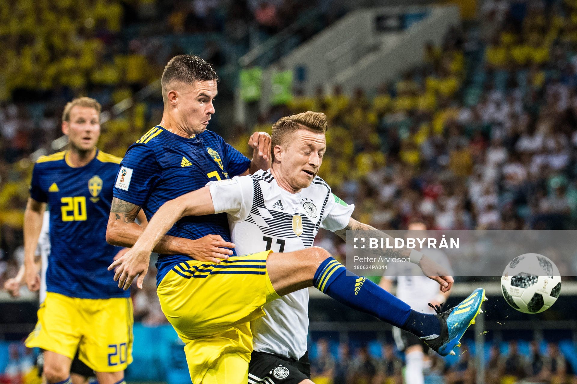 Mikael Lustig of Sweden in action with Marco Reus of Germany during the FIFA World Cup group stage match between Germany and Sweden on June 24, 2018 in Adler.