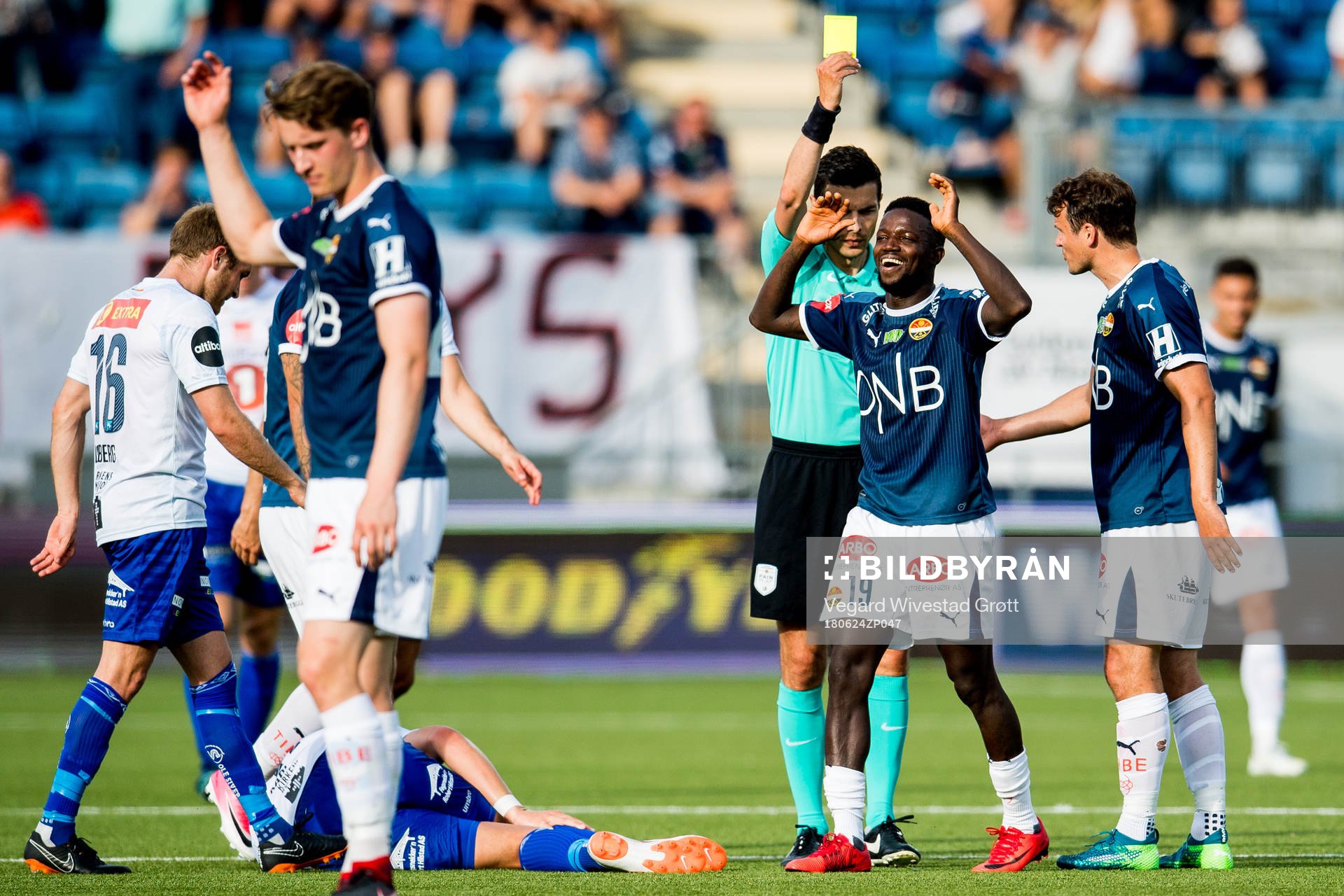 Francisco Júnior of Strømsgodset is shown a yellow card