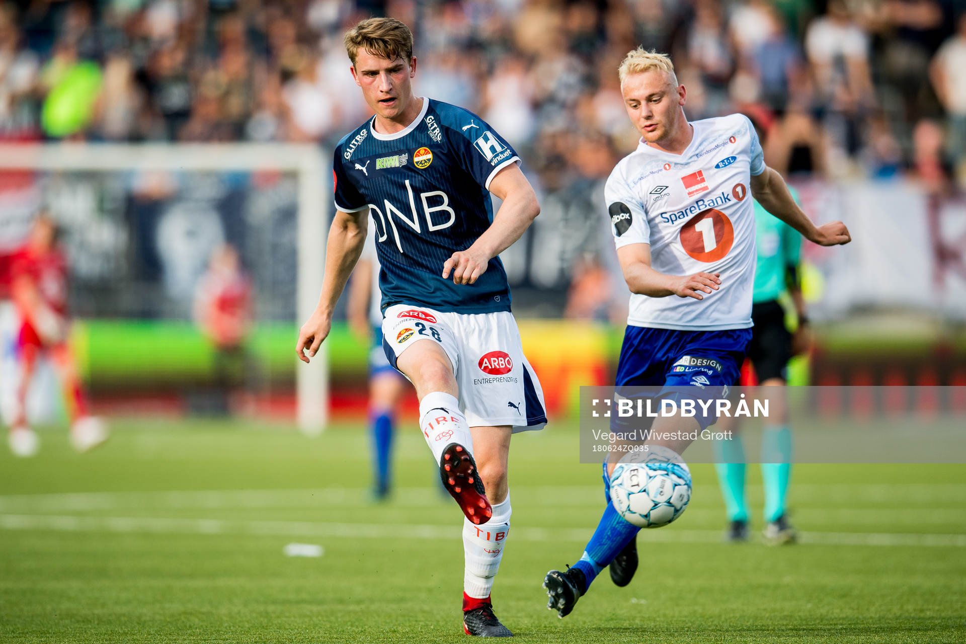 Marius Høibråten of Strømsgodset and Sondre Sørløkk of