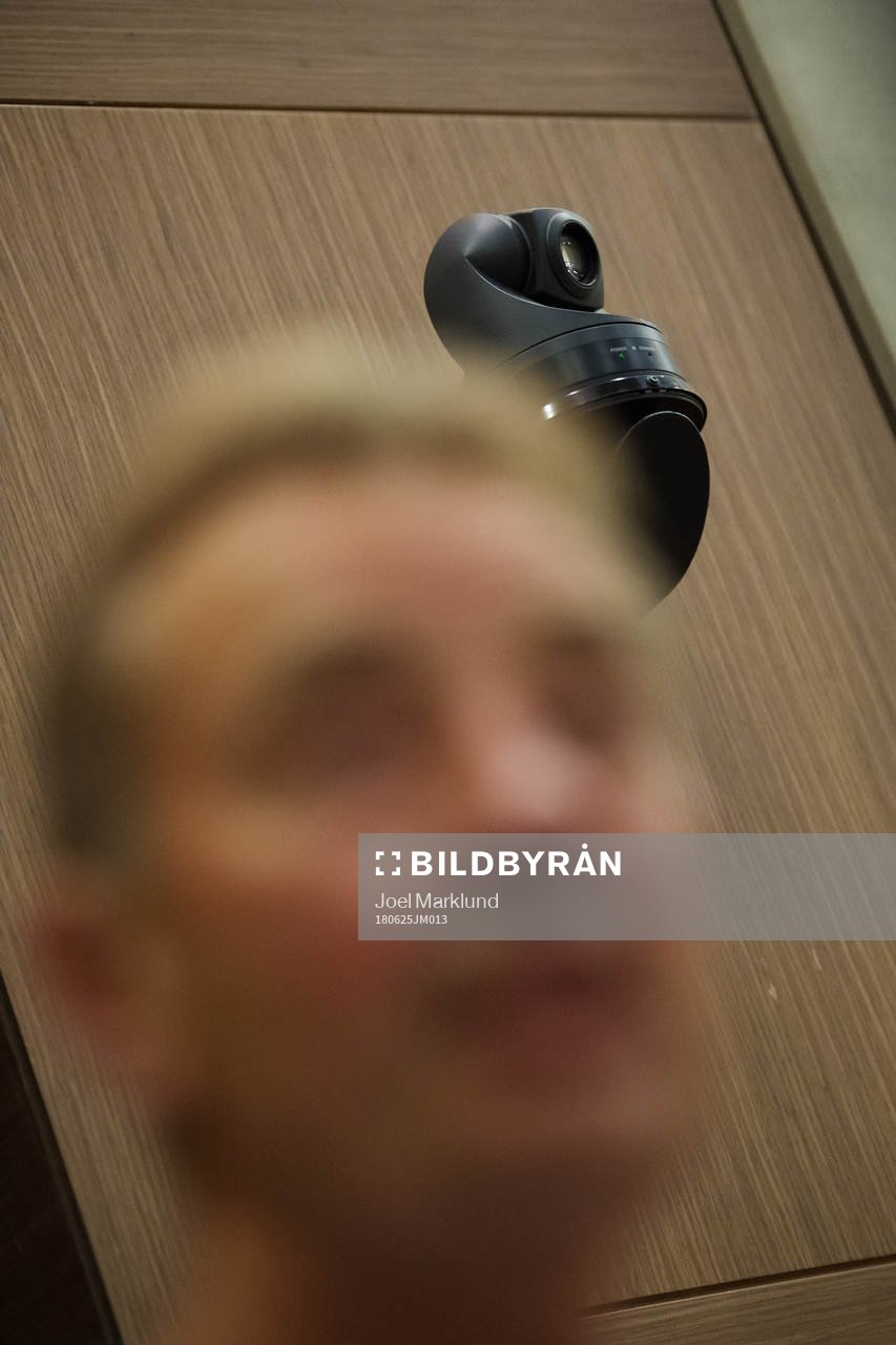 A security camera behind scout Tom Prahl of the Swedish