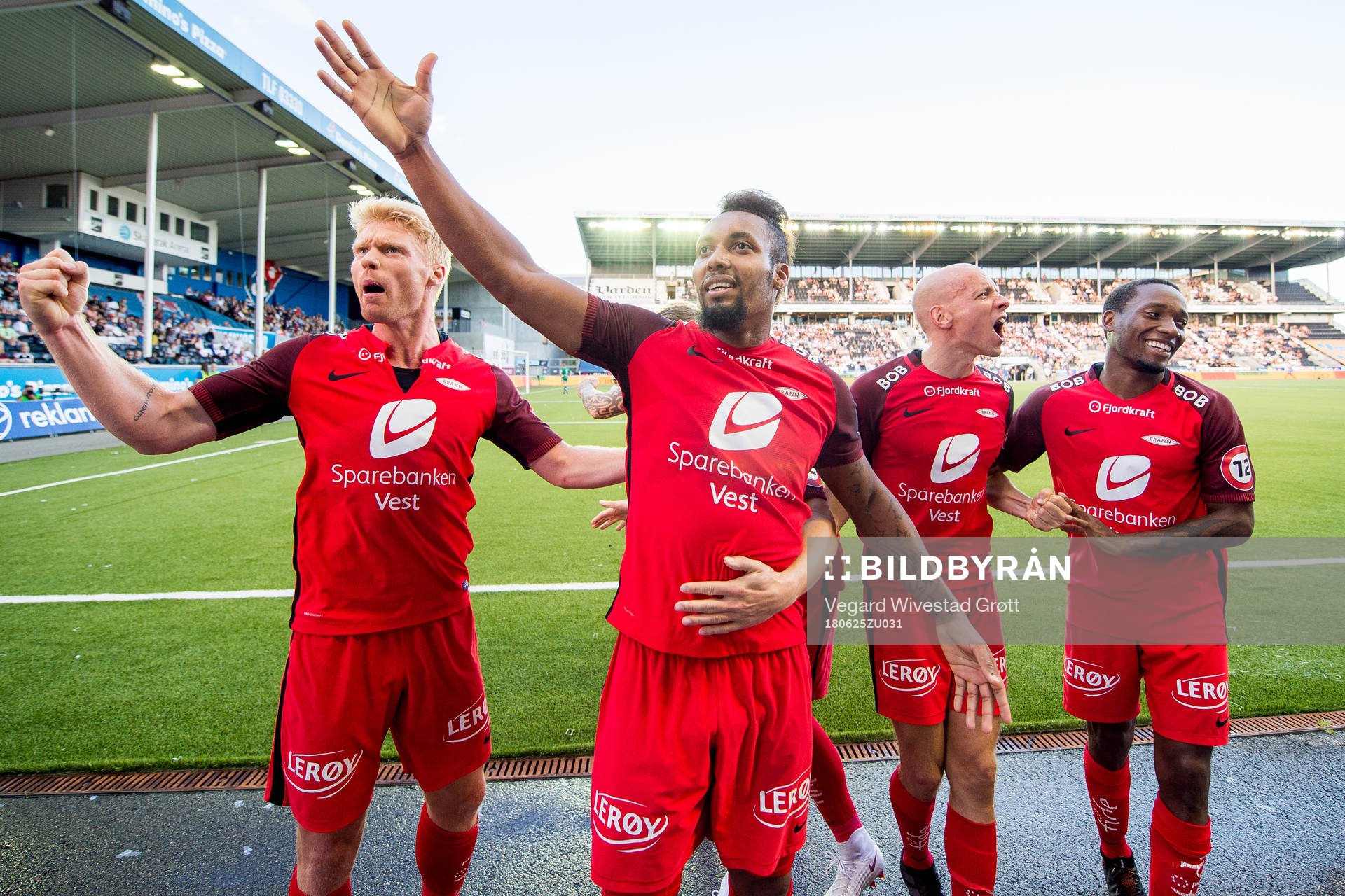 Bismar Acosta of Brann celebrates with teammates Sivert