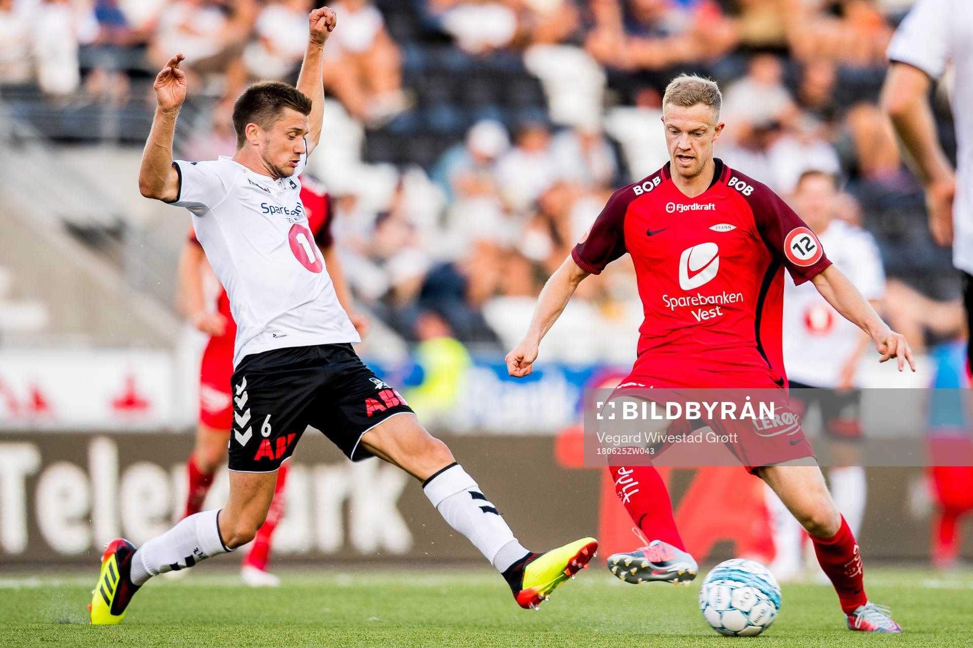 Vebjørn Alvestad Hoff of Odd and Peter Orry Larsen of Brann
