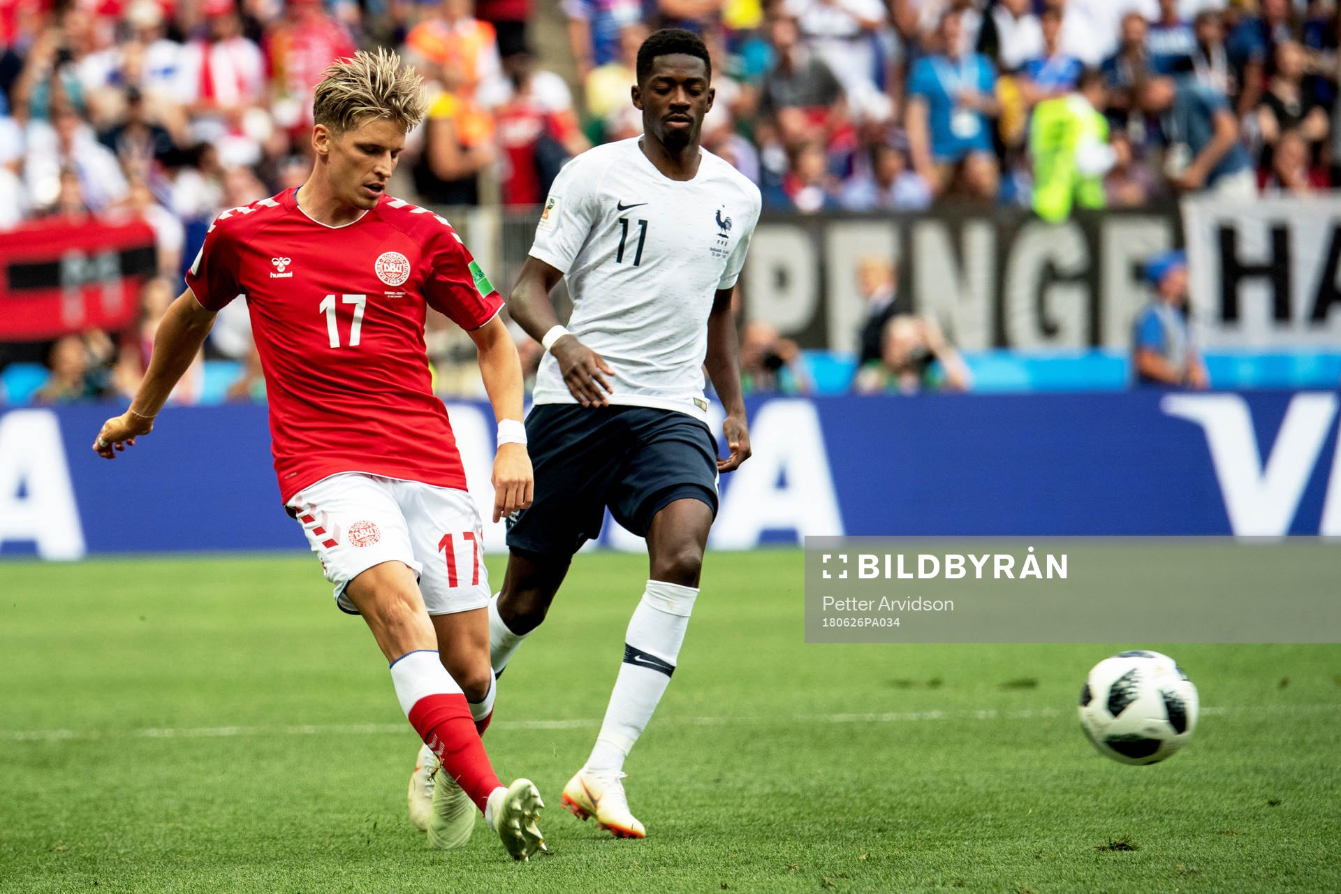 Jens Stryger Larsen of Denmark and Ousmane Dembele of France