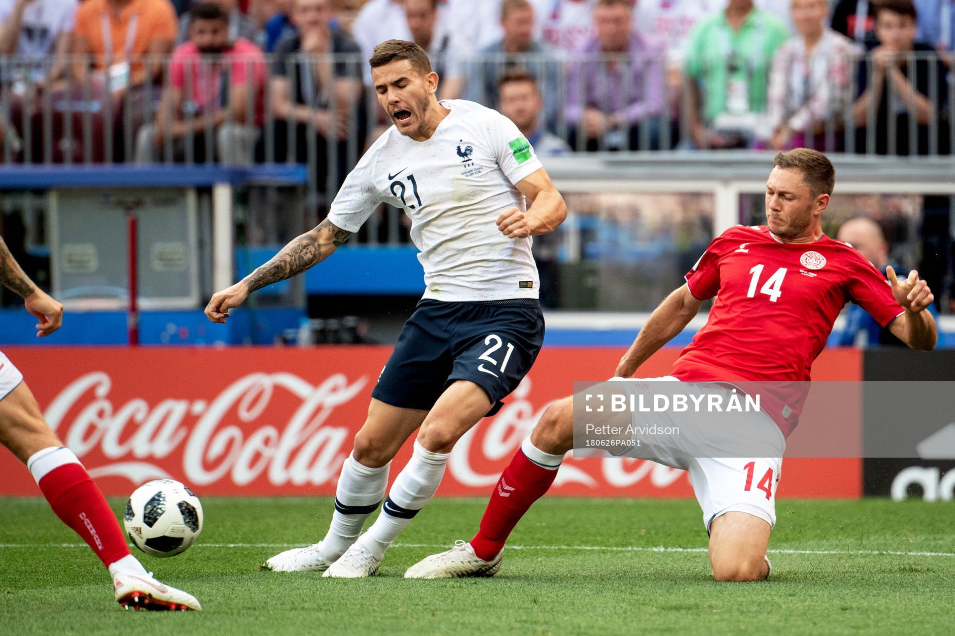 Lucas Hernandez of France and Henrik Dalsgaard of Denmark