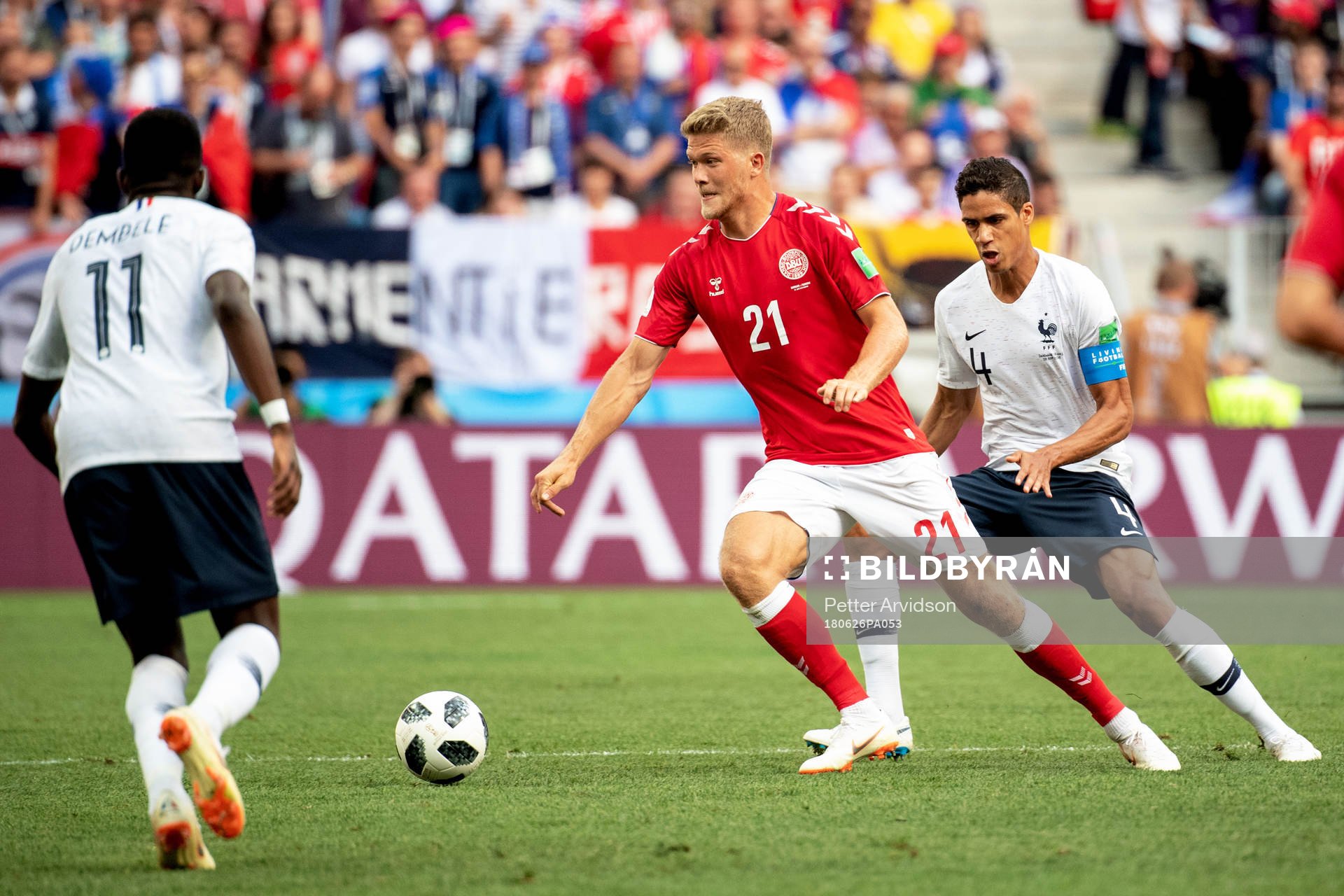 Andreas Cornelius of Denmark and Raphael Varane of France