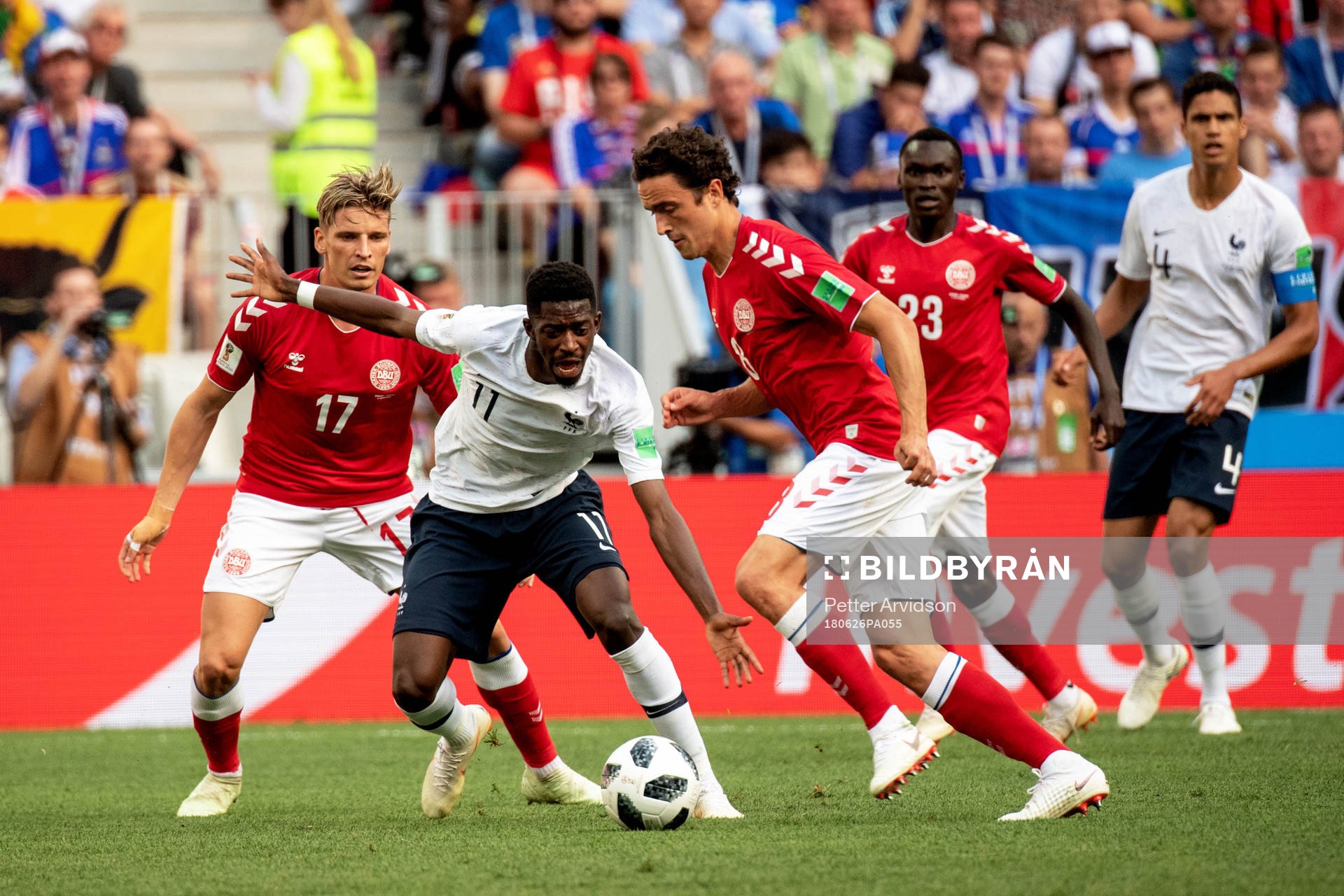 Ousmane Dembele of France and Jens Stryger Larsen and