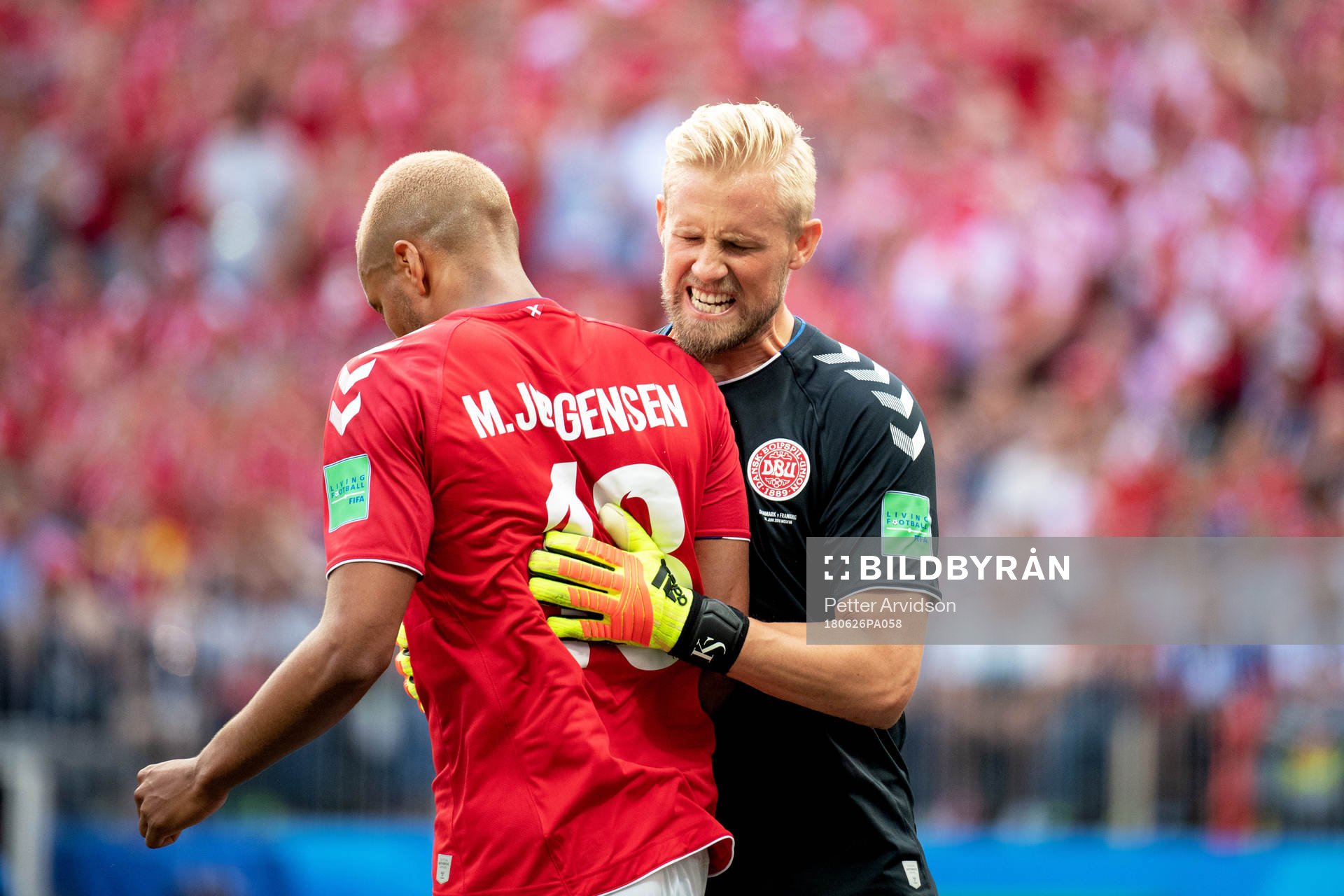 Mathias Jørgensen and goalkeeper Kasper Schmeichel of