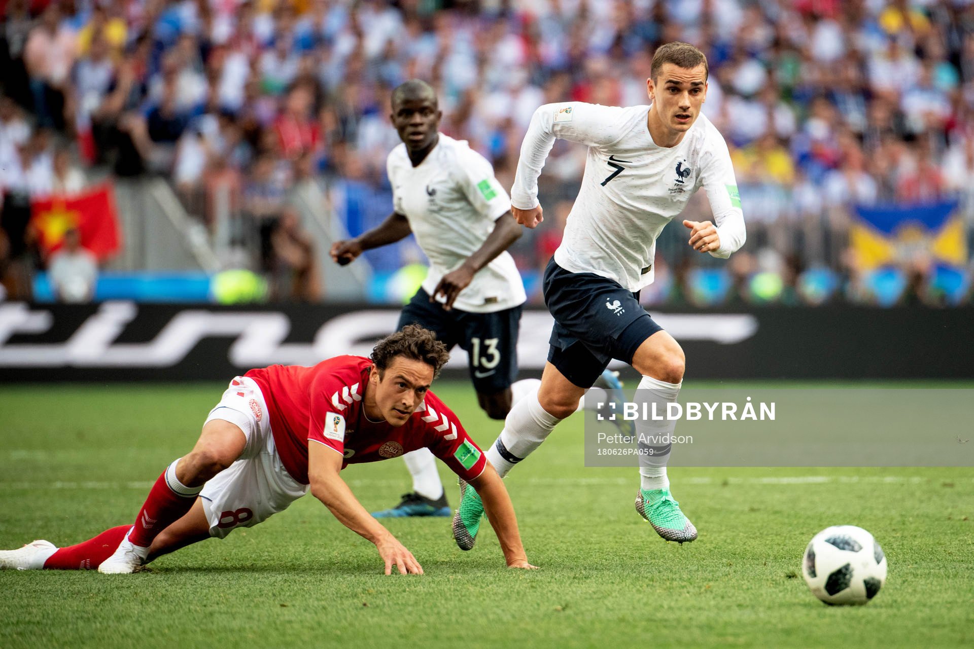 Thomas Delaney of Denmark and Antoine Griezmann of France