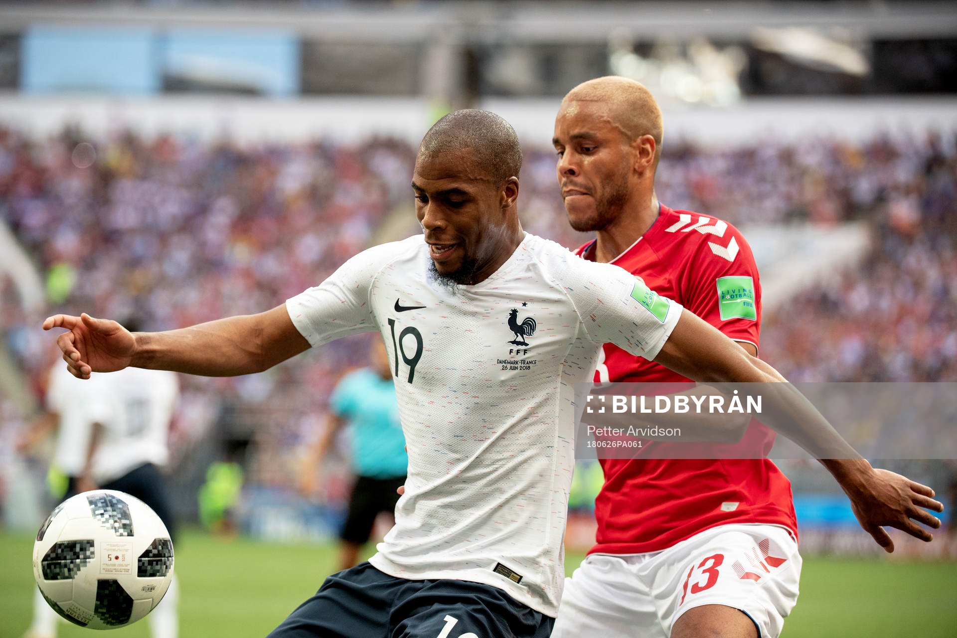 Djibril Sidibe of France and Mathias Jørgensen of Denmark during the FIFA World Cup group stage match between Denmark and France on June 26, 2018 in Moscow.