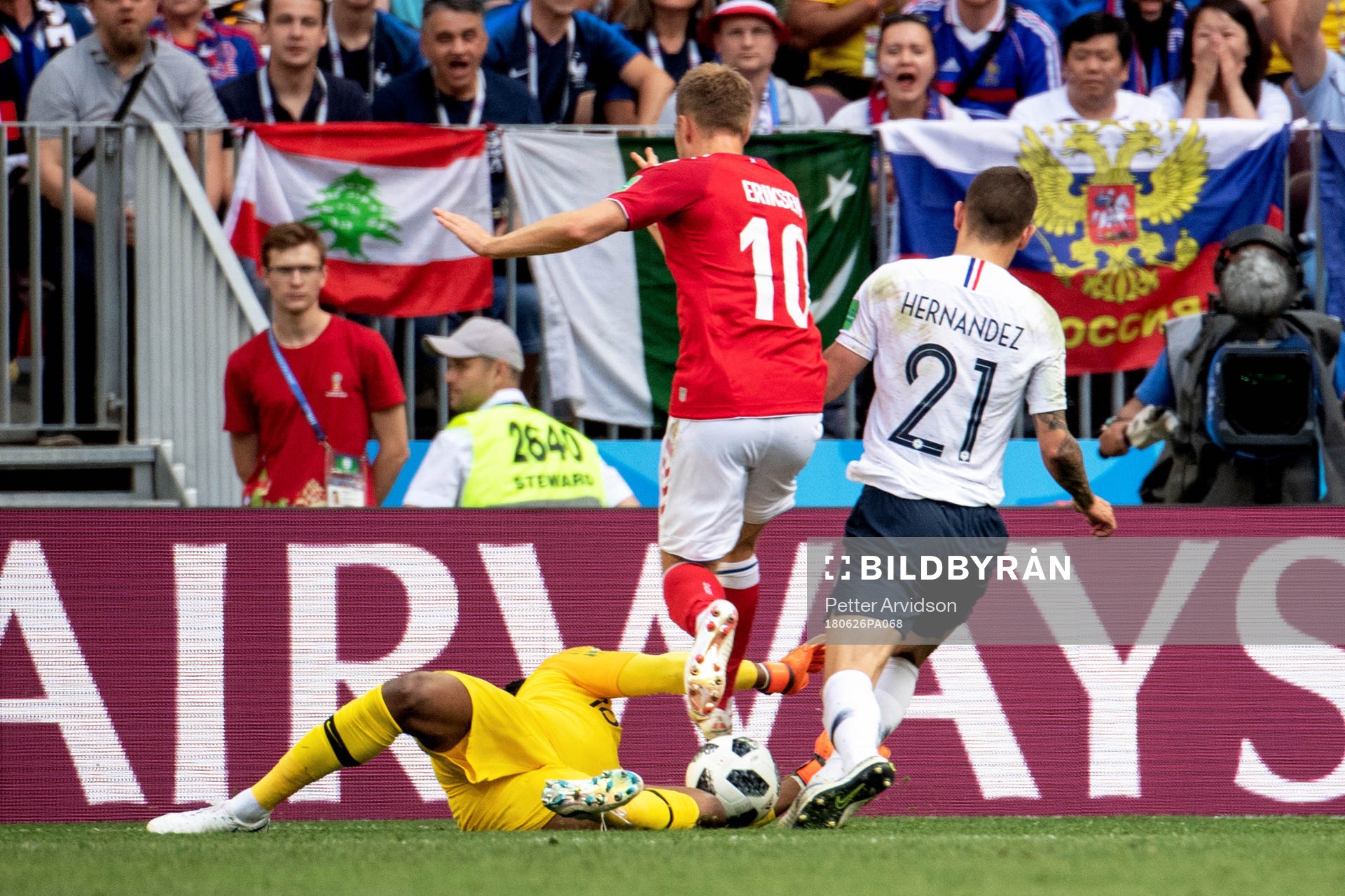 Christian Eriksen of Denmark goes down in the penalty area