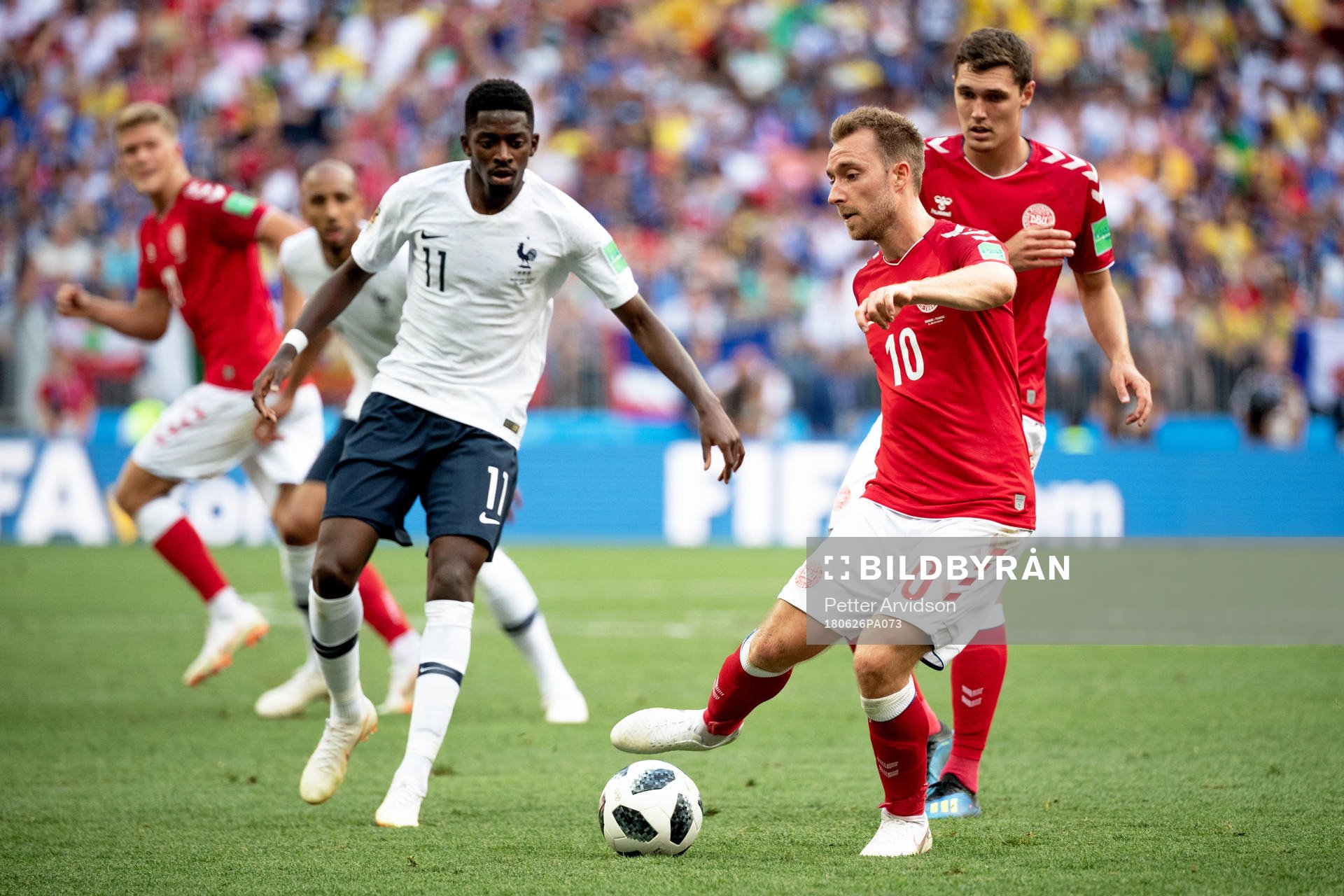 Ousmane Dembele of France and Christian Eriksen of Denmark
